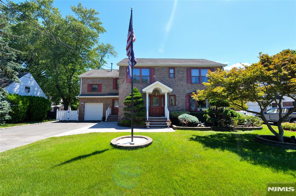 Welcome home to this charming New Milford residence, where timeless character, thoughtful design, and undeniable curb appeal come together beautifully. From the moment you arrive, the oversized decorative tiled foyer welcomes you with natural light, setting the tone. A conveniently located powder room sits nearby before the home effortlessly unfolds into a spacious living & dining room combination. Pocket doors lead to the sun-drenched four-season sunroom, wrapped in windows & abundant natural light, with French doors opening to the patio & beautifully fenced backyard. On the opposite side of the home, the eat-in kitchen with bar-top seating overlooks the inviting family room, complete with a cozy fireplace & sliding doors leading to the backyard & covered patio for effortless indoor-outdoor living. The second floor offers incredible versatility with a private en-suite bedroom featuring its own stairway. Two generously sized bedrooms offer dual closets, while the dreamy primary suite showcases a spa-like bath, custom walk-in closet with laundry chute, peaceful retreat, and the added convenience of an intercom system connected to the front door. The finished basement offers a rec room, gym, laundry, and utility space. Additional highlights include custom Closets by Design throughout, Kohler fixtures, surround sound, central vacuum, irrigation system, hardwood floors, vinyl fencing, and an attached garage. A home filled with warmth, charm, and room to truly make memories.
