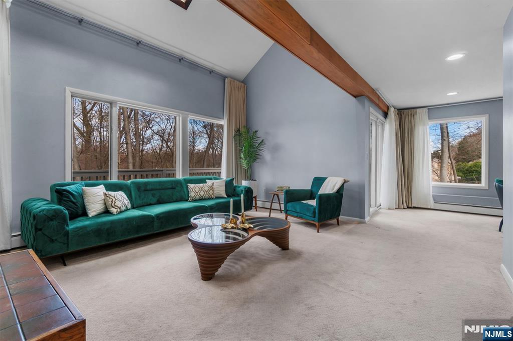 Beautiful 3 bedroom, 2.1 Bath Colonial in the prestigious town of Franklin Lakes! A private oasis that is meticulously maintained, has an open concept layout, and lovely views of Cooks Pond! Entry Foyer leads to sophisticated, sun-filled Living Rm W/fpl & vaulted ceiling that opens to spacious Dining Rm W/SGD to large Deck. This living space has abundant natural light, fostering warm ambiance & seamless connection to nature...perfect for everyday living & entertaining! Gorgeous Chef's Kitchen boasts high-end appliances, ample counter space, & seated island. Pretty PR and entry to 2 car garage are also on the1st floor. Upstairs the LUX Primary Bedroom offers elegant private bath and sizable Walk-In Closet. 2 large bedrooms, Full Bath, Laundry and spacious loft(perfect for relaxing)complete this level. Expansive driveway. Easy access to trains and highways. Great home for downsizing! Wonderful town W/Excellent Schools! WANT MORE INFO? CONTACT LISTING AGENT MARJORIE FIORI@201-572-8901.