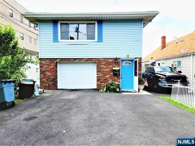 Well updated first-floor unit in a prime, highly convenient location! This move-in ready home features hardwood floors throughout, a private separate entrance, and one assigned outdoor parking space. Commuters will love the exceptionally easy access to the NYC Express bus, George Washington Bridge, and all major highways. Just minutes to premier shopping, dining, and local schools. A small pet may be considered.