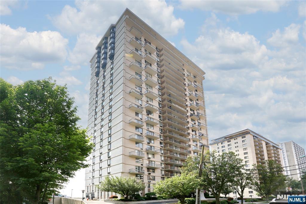 Wake up and unwind each day with breathtaking skyline views from this spacious one-bedroom corner residence in Hackensack's iconic Devonshire buildingâ€”famous for being the tallest residential building in the city. This beautifully maintained condo offers the perfect blend of comfort, style, and convenience. The updated kitchen is ideal for everyday living and entertaining, while the oversized bedroom features four generous closets, providing exceptional storage. The spacious living room is filled with natural light and showcases spectacular skyline and sunset views. The dining area opens to a private balcony, where you can relax and enjoy those same breathtaking sunsets at the end of the day. Residents enjoy an array of amenities, including a 24-hour concierge, outdoor swimming pool, fitness center, and additional storage. Monthly maintenance includes all utilitiesâ€”electric, heat, hot and cold waterâ€”for exceptional value and peace of mind. The unit also comes with two indoor parking spaces ($55 per month, each). Ideally located just minutes from Hackensack University Medical Center (HUMC), NYC bus service, the train station, shopping, restaurants, and major highways, this home offers an easy commute and an unbeatable location. Whether you're commuting to Manhattan or looking to be close to one of New Jersey's premier medical centers, this condo delivers both convenience and an exceptional lifestyle.