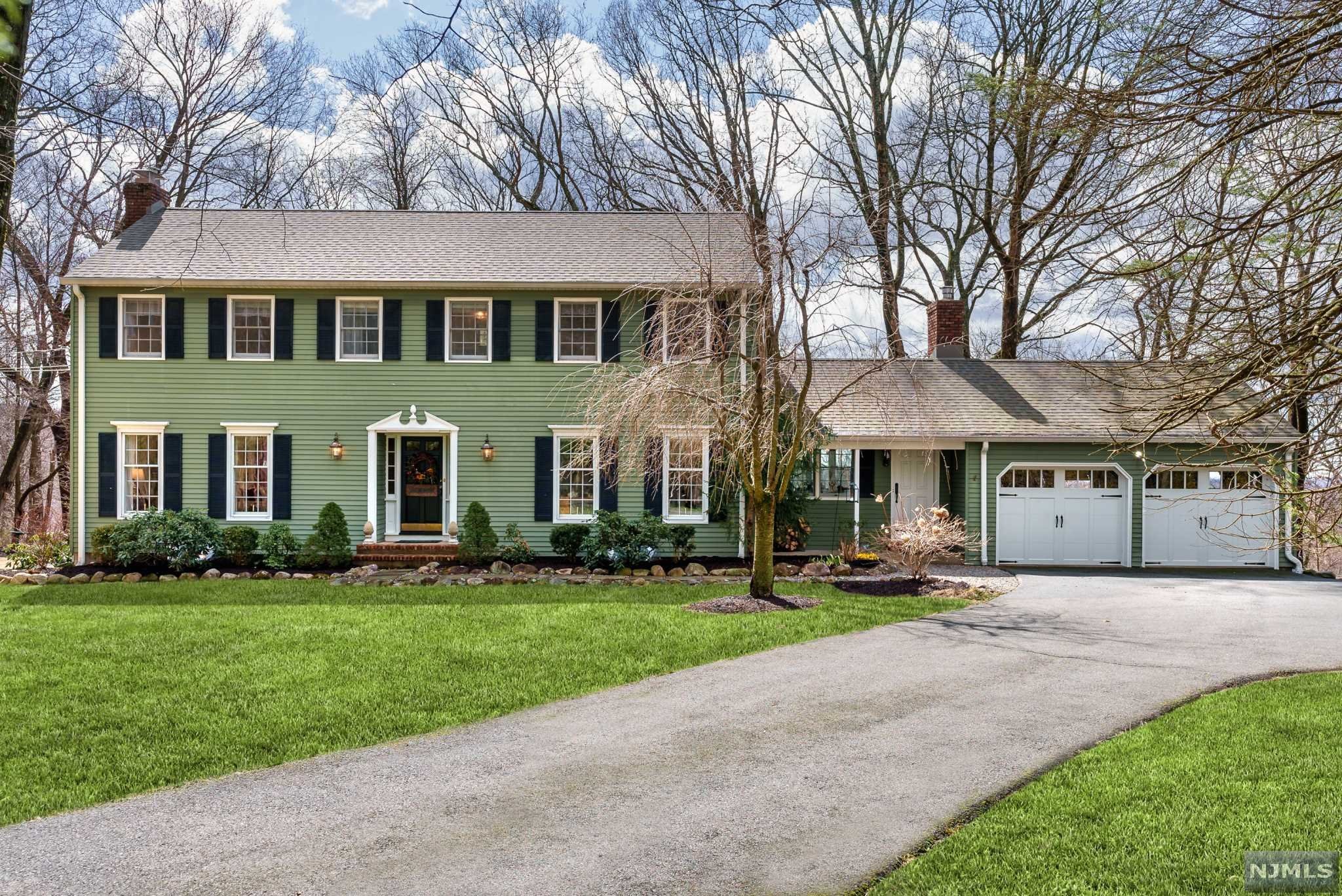 Welcome Home to this Spectacular Sun Filled CHC with Charm and Character on a Quiet Cul-De-Sac Tucked away for Privacy. Steps away from the Association Life Guarded In-Ground Pool and Kiddie Pool with Fun activities for everyone. The Main Level Offers a Front to Back LR W/Brick FRPL & Doors to the Large Deck to take in the Amazing Sun Rise & Sun Sets. Formal DR W/HWFLRS, Double Doors & Crown Moldings. EIK with Granite Counter Tops, Newer Top of the Line SS Appliances & Breakfast Bar Open to the Family Room with a Brick FRPL, Slate Floors & Beamed Ceiling. 1/2 Bath & Office or Possible 5th BR with Closet complete the main level. The Second Level offers the Primary BRM with HWFLRS A walk-in Closet, an Update Primary Bathroom with a Tub/Shower & a Vanity W/Marble. 3 Addit BR's & Full Bathroom. A main level Garage. Top Rated Schools, Close to Shopping, Restaurants, Parks, Golf, Public Transportation and only Approx. 30 Miles from New Yok City.