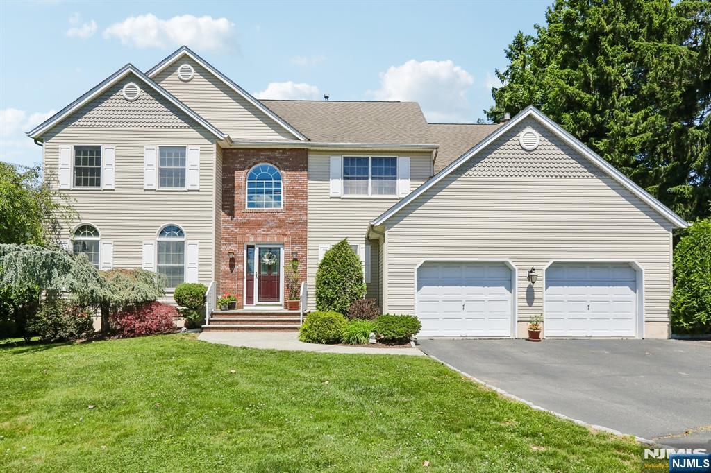 Welcome home to this beautifully maintained Center Hall Colonial in sought-after Fairfield. Set on a generous .51-acre lot, this 4-bedroom, 2.5-bath home offers a classic layout, spacious rooms, and the perfect blend of comfort and functionality.The main level features a formal living room, formal dining room, spacious eat-in kitchen that openly flows into the inviting great room, a half bathroom, convenient laundry room, and direct access to the attached 2-car garage. Just off the kitchen, a large Trex deck leads to a private expansive backyard which borders a cul-de-sac. This backyard creates the perfect setting for outdoor dining, entertaining, and relaxation. The second floor offers four generously sized bedrooms, including a spacious primary suite complete with a walk-in closet, additional storage room, stand-up shower, and jetted tub. A full bathroom serves the additional bedrooms. The unfinished basement provides ample storage space and flexibility for a variety of uses, whether as a recreation area, home gym, workshop, or additional living space. Additional highlights include a 2-zone HVAC system, whole-house attic fan, pull-down attic access to a spacious attic offering abundant storage, and an attached oversized 2-car garage. Located within the highly regarded West Essex Regional School District, this Fairfield home is also conveniently close to shopping, dining, parks, and major highways, providing an exceptional combination of space, comfort, and convenience.
