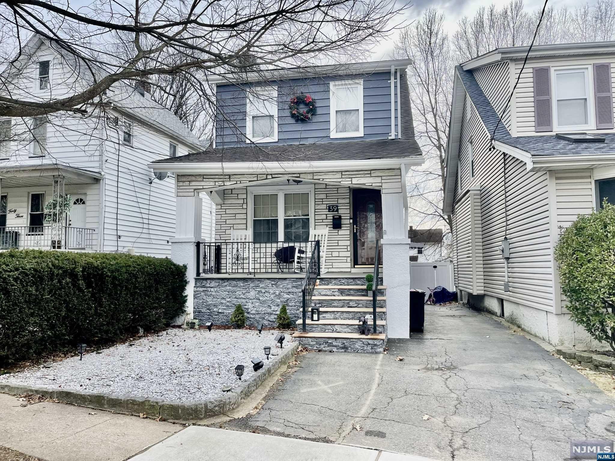 Welcome Home as you walk onto this LARGE front porch and enter this BEAUTIFUL 3 bedrooms, 2 full baths Colonial. First floor opens up into the Living Room, Dining Room and newly renovated Kitchen with granite counter tops and separate island. Finished basement with family Room, full bath laundry and utilities. Access to the large newly FENCED backyard.