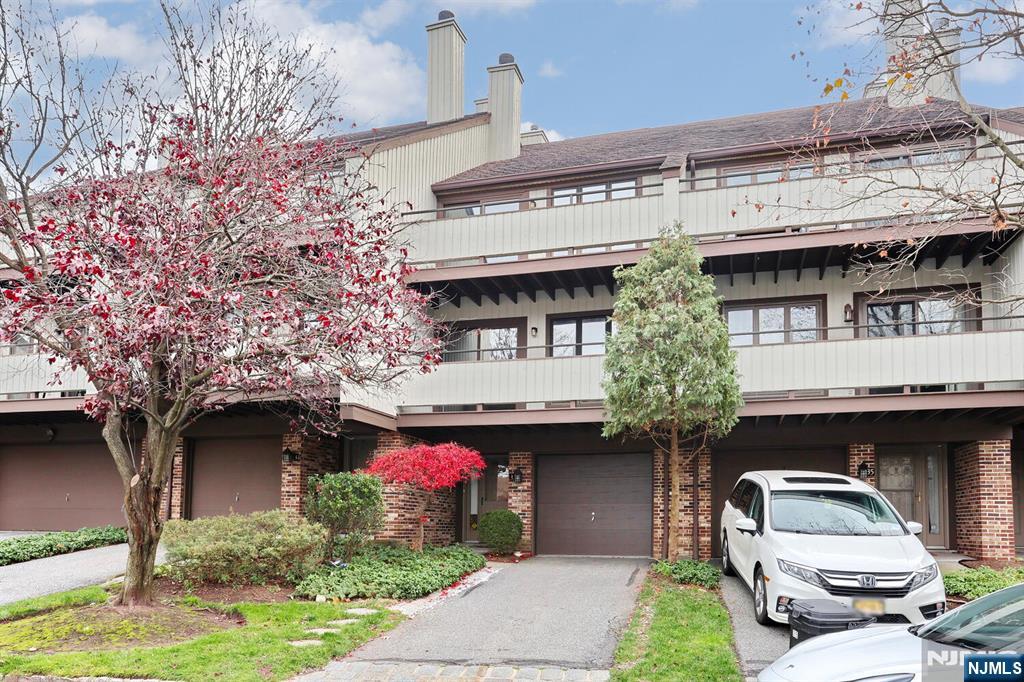 Welcome to Meadowview - one of Leonia's most sought-after communities, perfectly situated on a quiet cul-de-sac. This move-in ready and spacious townhouse offers 2 bedrooms and 2.5 bathrooms, including a primary suite with a full bath and private balcony. Enjoy a gourmet kitchen with a cozy breakfast nook and sliding glass doors that open to the deck and backyard. The living room features a fireplace and another set of sliding doors to a private balcony. Hardwood floors throughout. Located within Leonia's highly regarded school system and conveniently close to Overpeck Park, NYC transportation, and major highways. Don't miss this opportunity- schedule your visit today!