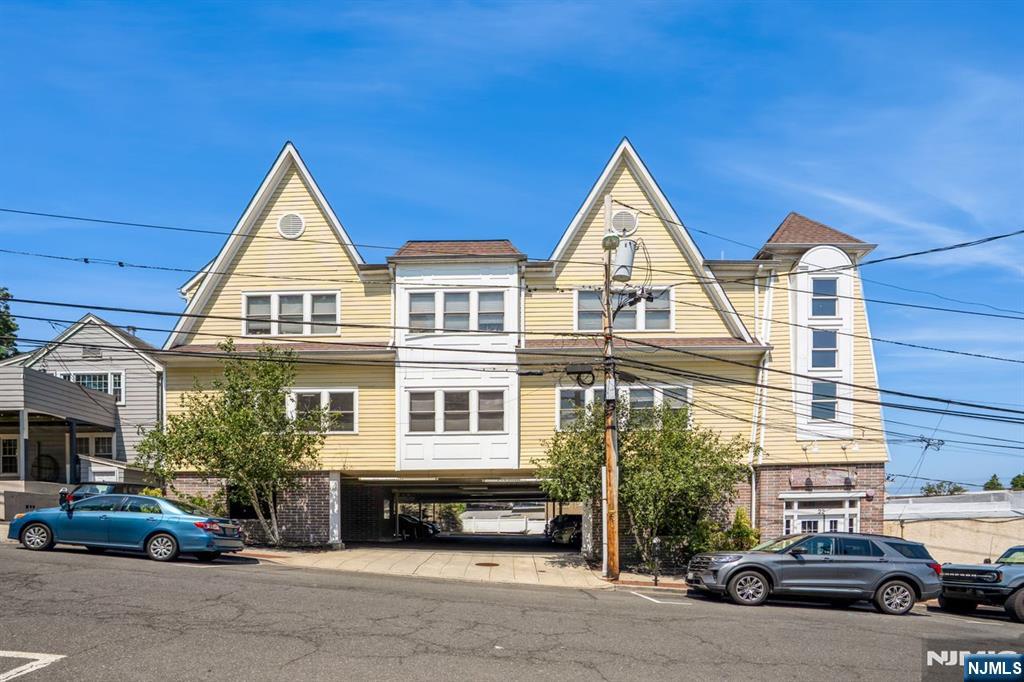 Welcome to 22 Sylvan Street â€” a beautifully maintained 2-bedroom, 2-bathroom condo located in the heart of vibrant downtown Rutherford. This spacious home features soaring ceilings, gleaming hardwood floors, and oversized windows that flood the space with natural light. The modern kitchen is equipped with stainless steel appliances, granite countertops, and ample cabinet space, perfect for both cooking and entertaining. Both generously sized bedrooms offer direct access to a private balcony â€” an ideal spot to enjoy your morning coffee or unwind in the evening. The primary suite includes an en-suite bathroom and plenty of closet space. Additional highlights include central air, in-unit laundry, and two deeded parking spots in a convenient elevator building. Situated just minutes from the train station, local restaurants, shops, and cafes, this home combines comfort, style, and unbeatable convenience â€” an exceptional opportunity for commuters and anyone seeking a dynamic lifestyle in the heart of Rutherford.