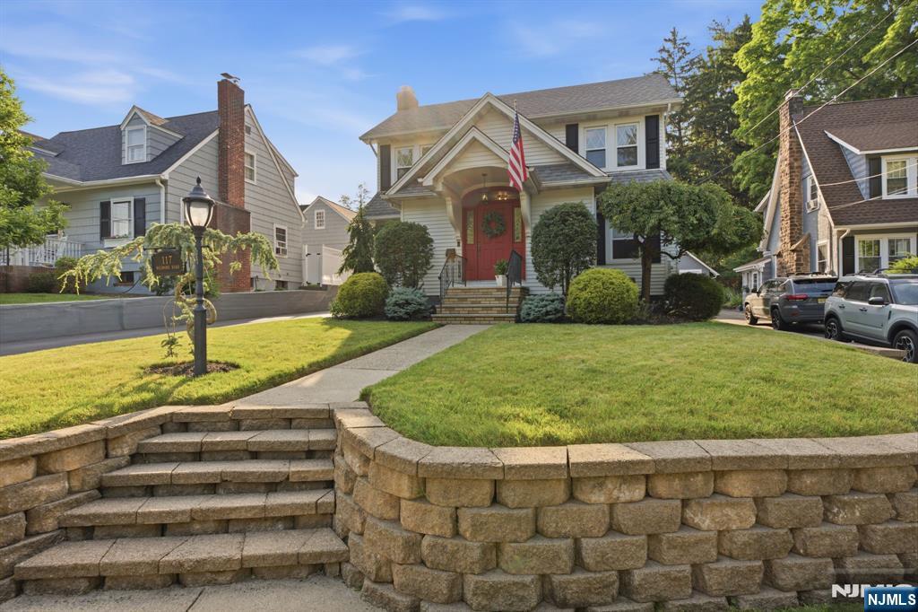 Welcome to this beautifully maintained 3-bedroom, 2 full and 1 half bath home that perfectly blends timeless character with modern updates. Rich chestnut millwork, elegant crown moldings, and hardwood floors create warmth and sophistication throughout. The updated kitchen features a center island, premium Sub-Zero refrigerator, and flows seamlessly into the spacious family room with direct access to a stunning paver patio complete with a built-in gas fire pit, perfect for entertaining. A spacious formal dining room provides the ideal setting for hosting holidays, dinner parties, and special occasions. The inviting living room offers a cozy wood-burning fireplace, while the convenient mud room adds everyday functionality. Upstairs, the renovated bathrooms feature double vanities, including a luxurious primary bath with marble tile, an oversized walk-in shower, and a rain shower head. A finished basement provides additional living space ideal for a recreation room, home office, or gym. Additional highlights include a newer tankless hot water heater, whole-house in-ceiling speakers for music throughout, central air, and an oversized detached garage. Ideally located close to major highways, shopping, restaurants, parks, and the vibrant center of town, this exceptional home offers comfort, style, and convenience in one of Little Falls' most desirable locations.