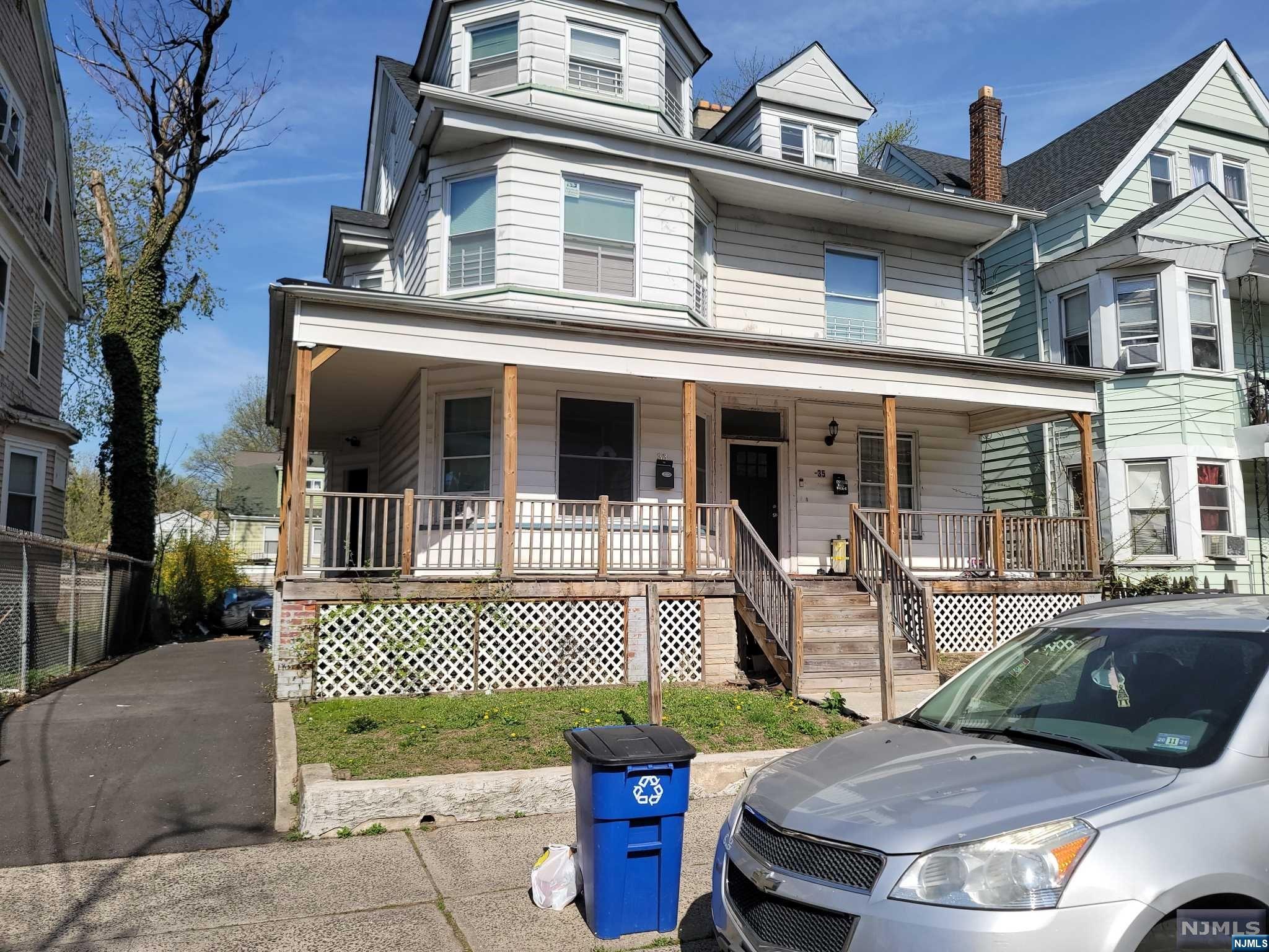 A large 2-family home that was renovated in 2017. Renovations included kitchens, baths, roof, HVAC, and water heaters. Conveniently located to Garden State Parkway entrance. Possible vacant 1st floor. 1st floor with 3 bedrooms, 1 bath, living room, and eat in in kitchen. The 2nd floor with 3 bedrooms 1 bath, living room & eat in kitchen. 3rd floor which has 2 additional large rooms and a full bath. The 1st & 2nd floor have hardwood in the bedrooms and living rooms, tiled bathrooms, and vinyl flooring in the kitchens. There is a large basement unfinished basement