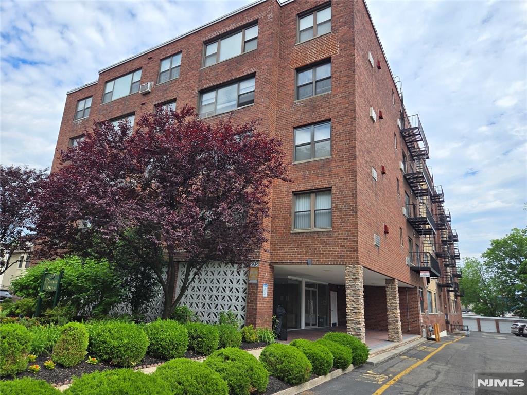 Spacious One-Bedroom Condo with Parking in Downtown Fort Lee! Discover the ideal opportunity to own a bright and airy one-bedroom condo, complete with one parking space, in the heart of downtown Fort Lee. This home features a large living room, a versatile dining/office space that can easily serve as a guest room, and a generous walk-in master closet. Ample storage is available throughout, including two spacious closets in the living area and a pantry in the kitchen, while east-facing windows fill the space with natural light. Located in a meticulously maintained elevator building, this condo is just one block from downtown Fort Lee, offering unmatched convenience. Enjoy quick access to NYC transit (a 3-minute walk to buses 158/188) and major highways including the GWB (3-minute drive). Everything you need is nearby: restaurants, cafes, boutique shops, US Post Office, library, and highly regarded #1 elementary school. Additional amenities include on-site laundry facilities and a superintendent, making daily living easy and convenient. Experience the charm of a vibrant small-city atmosphere without sacrificing peace and comfort. Note: Property is being sold As-Is and wood floors under the carpet