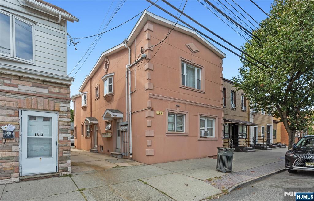 ATTENTION ALL INVESTORS ! Unique 3 family plus BONUS studio in the heart of Hackensack within a mile of the reknown Hackensack hospital. Unit 1 has 1 bedroom and 1 bath with shower over tub. Hardwood floor. Living Room. Eat-In-Kitchen. Unit 2 has 2 good size bedrooms. Living Room. Updated Eat-In-Kitchen with Granite Countertops and Breakfast Bar. Dining Area. Recessed lights. Hardwood floors. Central Air. Washer/Dryer hook ups. Attic with bessler stairs. Bay window. Bathroom with shower over tub. Unit 3 has 1 bedroom. Living Room. Eat-In-Kitchen. Bathroom with shower over tub. Converted garage is Studio with Living Room, Kitchenette. Bathroom has shower. 2 off street parking spaces. Free overnight street parking. Shared Driveway. Ideally located to schools, shopping, dining and NYC transportation right on Hudson St. A truly fantastic opportunity. Not to be missed !