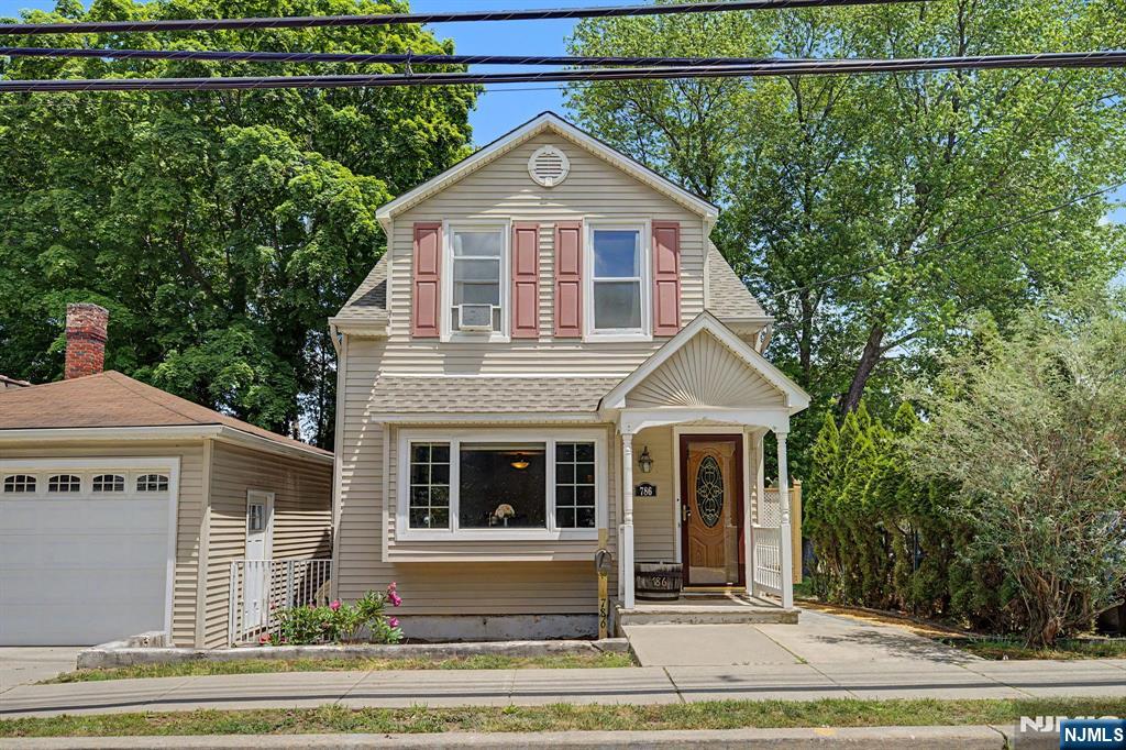 Welcome to 788 Belmont Avenue, a charming colonial-style home with a 2-car garage situated on a double-lot. The first floor features a spacious living room with a gas fireplace and dining area, a large eat-in kitchen with wooden cabinets, stainless steel appliances, and a door to the deck that walks out to the backyard, and a renovated full bathroom. All four bedrooms are on the second floor, and the walkout basement that has laundry and utilities. The huge backyard provides an excellent outdoor space with a patio that is great for entertaining. This home is well maintained with a new roof installed in 2023, conveniently close to schools and restaurants, and is turnkey ready for its new owners!