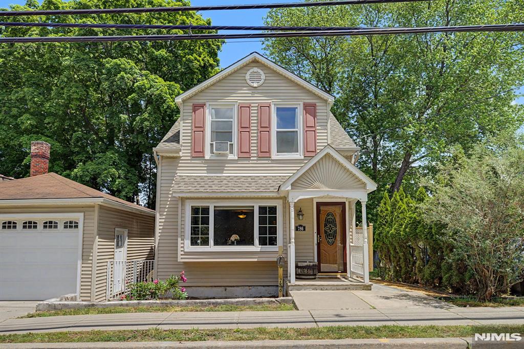 Welcome to 788 Belmont Avenue, a charming colonial-style home with a 2-car garage situated on a double-lot. The first floor features a spacious living room with a gas fireplace and dining area, a large eat-in kitchen with wooden cabinets, stainless steel appliances, and a door to the deck that walks out to the backyard, and a renovated full bathroom. All four bedrooms are on the second floor, and the walkout basement that has laundry and utilities. The huge backyard provides an excellent outdoor space with a patio that is great for entertaining. This home is well maintained with a new roof installed in 2023, conveniently close to schools and restaurants, and is turnkey ready for its new owners!