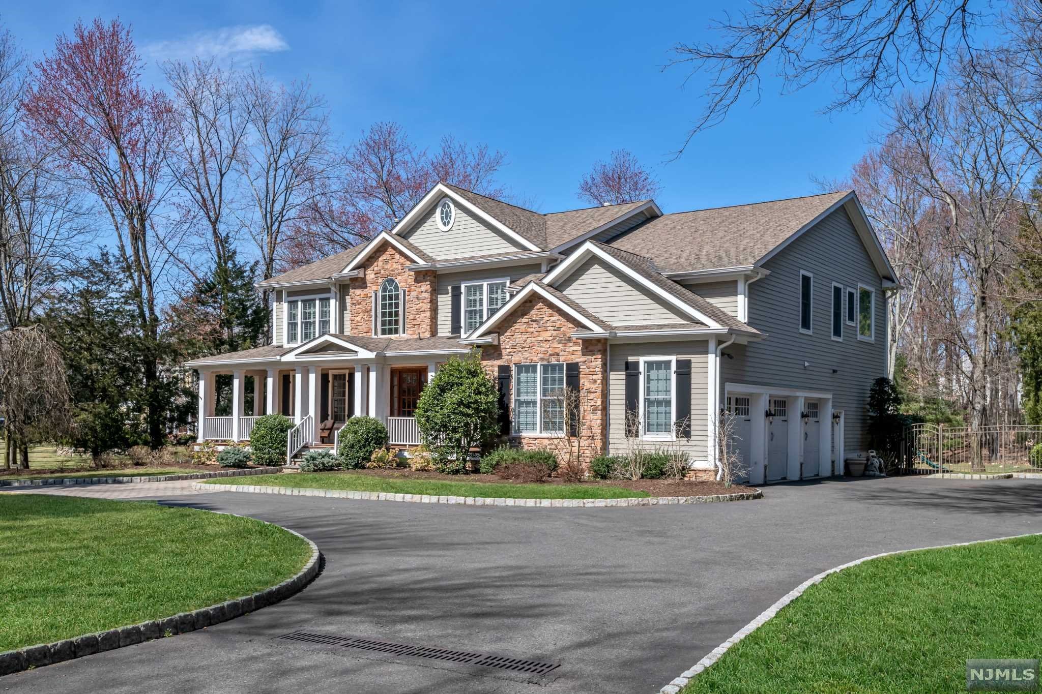 Built in 2006 and situated on .89 acres in a desirable Ho-Ho-Kus cul-de-sac location- this one has the size, scale and layout you've been waiting on! 2 story entry foyer & 2 story Great Room set the tone for these spacious rooms & open layout. Entry foyer w herringbone hardwood opens up to formal Dining Room & adjacent Living Rm. Great Rm features floor to ceiling stone wall with oversized windows allowing for loads of natural sunlight. Tremendous wrap around porch with access from inside as well. Kitchen features Custom cabinetry, stainless steel appliances & breakfast area w/ walk in pantry. First floor guest suite. Upstairs, spacious landing leads to 3 bedrooms, all with attached baths and tremendous closets. Plus master suite w/ tray ceilings, lg sitting room, dual walk-in his/her closets & oversized bath. 3 car garage, Sound system, security, sprinklers, generator & more! Beautiful property with room for all you can imagine! Don't wait on this one!
