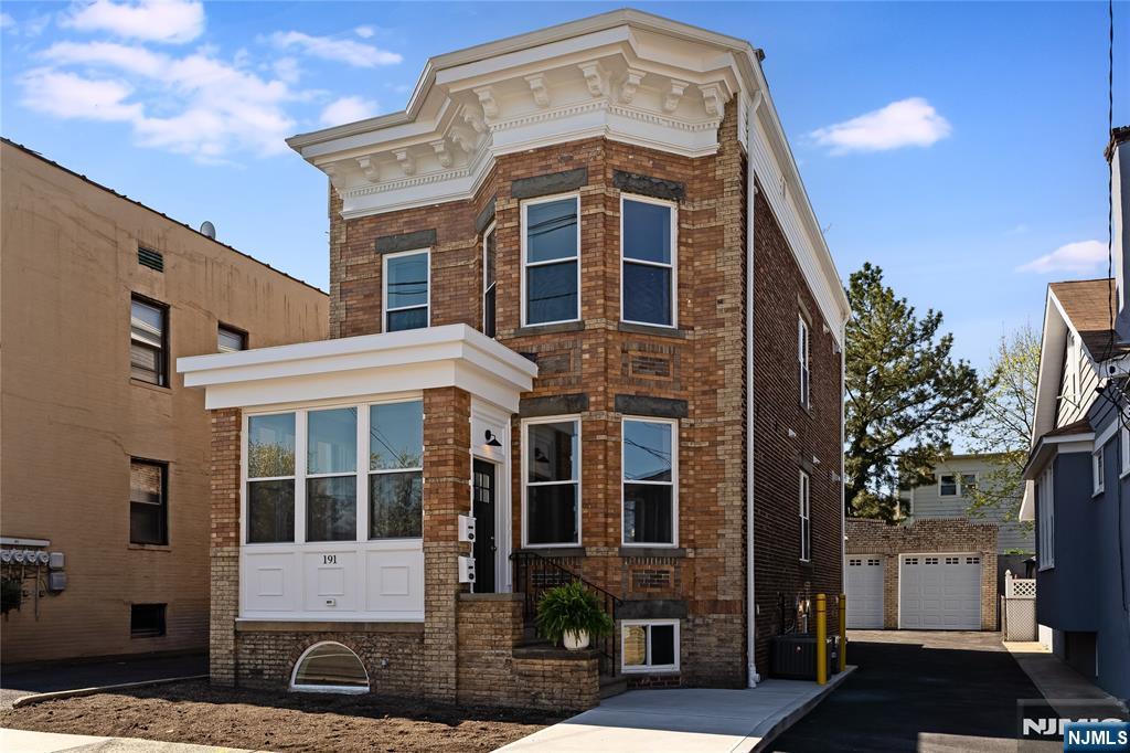 NORTHEND LOCATION! Rare opportunity to own a beautifully renovated multi-family in one of the most sought-after Northend neighborhoods. The property also features an oversized 3-car garage presenting endless possibilities. This exceptional property has been thoughtfully updated from top to bottom, including electrical, plumbing, and even a brand-new sewer lineâ€”offering true peace of mind for years to come. Timeless character meets modern living, with stunning preserved brickwork and original architectural details woven seamlessly throughout. A sun-drenched foyer welcomes you in, highlighted by a breathtaking staircase featuring a restored original railing paired with rich hardwood treadsâ€”an unforgettable first impression. Both units showcase matching hardwood throughout, creating a warm and cohesive feel. Each unit also offers its own dedicated laundry for added convenience. The first-floor unit enjoys exclusive access to an expansive walkout lower level complete with a full bathâ€”perfect for extended living and recreation adding additional income potential. Perfectly situated near top-rated schools, with easy access to public transportation to Port Authority, Route 3, the NJ Turnpike, and just minutes to the Lincoln Tunnel.