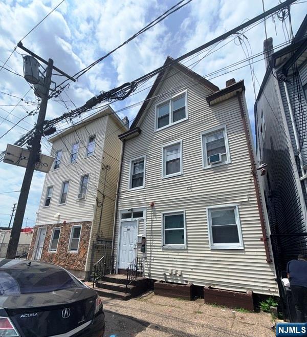 Excellent opportunity to own a fully renovated 3-family property in Paterson, NJ! Completely gutted and renovated in 2020, this income-producing property offers peace of mind with major updates already completed, including newer electrical, plumbing, roof, furnaces, and hot water heaters.Each of the three spacious units features 2 bedrooms, a living room, a kitchen, and a full bathroom, providing comfortable layouts that attract quality tenants. The property also offers separate utilities and separate meters, allowing tenants to pay their own gas, electric, heat, and water expenses, maximizing your return on investment.Whether you're looking to expand your investment portfolio or live in one unit while generating rental income from the others, this property is truly a turnkey cash cow with nothing left to do but collect rent. Conveniently located near shopping, schools, public transportation, and major highways.