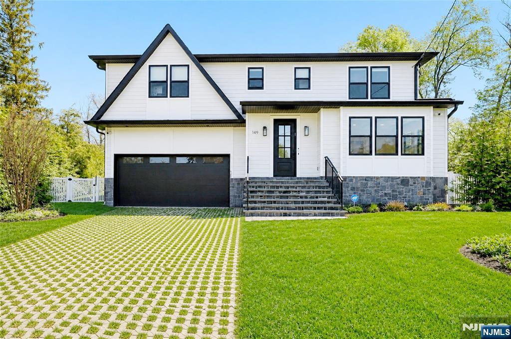 Modern Elegance meets smart & functional, all in a coveted Cresskill location! Stunning 5 bedroom, 5.5 bath residence w/ open floor plan, exquisite hardwood floors & seamless design & smart home features throughout. Natural light beams through each room highlighting the expansive living, dining & family rooms + true chefâ€™s kitchen w/ center island & premium appliances. Designed w/ exceptional attention to detail, home is equipped w/Nest-controlled multi-zone HVAC, Nest smoke detectors, & 17 interior & exterior cameras & more. Second level boasts enviable primary suite w/ walk-in closets & a spa-like bath + lower level is fully finished & perfect for rec activities. Entertain in resort-style outdoor living w/ a heated saltwater pool + outside kitchen & bbq & pizza over & cabana w/bathroom & outside shower, 2 outdoor high capacity space heaters, Sonos sound throughout & more. No stone has been left unturned w/ heated bathroom floors, electric blackout shades, gas-heated garage, Tesla chargers & additional premium upgrades throughoutâ€”offering a seamless blend of comfort, technology & elevated living in a prime location, truly a must see.
