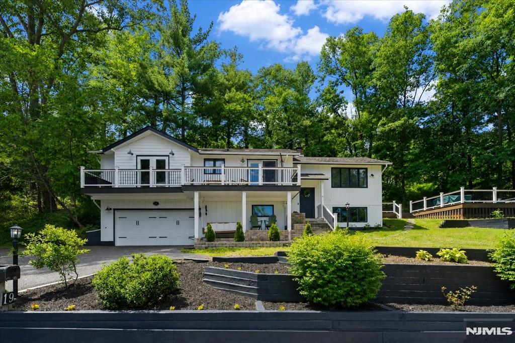 Welcome to premier Greenwood Lake living at its finest in the highly sought after Lakeside Community. Nestled on a quiet street and private lot with lake views from almost every single room in the house. This very new fully renovated home boasts 3 bedrooms (and extra bonus room) 3 FULL baths and a gorgeous open concept layout all throughout. Pride of ownership and craftsmanship in every square inch of this home and property. The most perfect opportunity awaits to experience lake living while avoiding lakefront taxes and still enjoying all of the amenities that come along with the lake such as swimming, boating, paddleboarding and much much more. Close proximity to Warwick, New York where you can enjoy a beautiful downtown or restaurants, shops, wineries, and SO much more. This is one you will not want to miss.