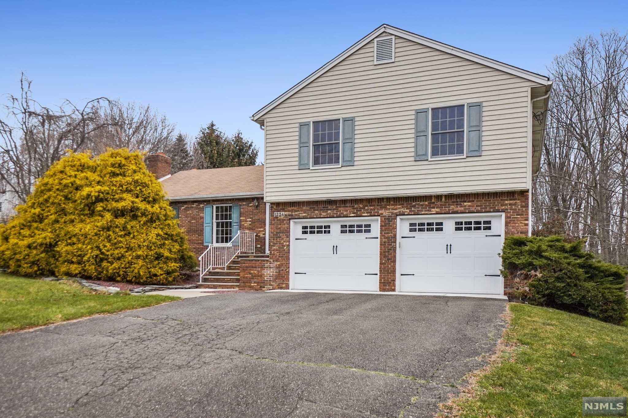 Are you ready to move up? New to the market Commuter friendly,Super nice 4 bedroom Split on rare 1.3 acre level lot bordering preserve land. Recent updates include Whole house generator, carpeting, and master bath. Easy access to Macopin Road, Route 23 and points south/east. Tons of interior and exterior space to create your own little paradise.