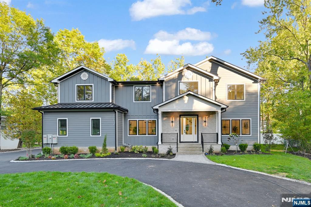 Stunning NEW CONSTRUCTION in the coveted Deerfield section, set on a flat, fully fenced 0.46-acre lot. Spanning approx. 7,500 sq ft inc garage across 3 finished levels, this home features 7 bedrooms, 6.5 baths, oversized 2-car garage & a circular driveway. A dramatic 2-story foyer opens to sun-filled interiors with 10â€™ ceilings on the first and second floors and 9â€™ ceilings in the finished basement.The family room w/ fireplace & built-in speakers flows seamlessly into a gourmet chefâ€™s kitchen w/ an oversized island, custom cabinetry & hood, Sub-Zero & Wolf appliances, double wall ovens, walk-in pantry, & breakfast nook. Formal living & dining rooms plus a sophisticated bar area create an ideal setting for entertaining, while a first-floor en-suite, mudroom, & powder room add everyday convenience.Upstairs, the primary suite offers dual walk-in closets & a spa-like bath w/ soaking tub, dual vanities & oversized shower. Four additional bedrooms include two en-suites w/ walk-in closets & two connected by a Jack-and-Jill bath, along w/ a full laundry room. The finished basement features a media room, recreation space w/ built-in speakers, office, fitness studio, guest suite, full bath & storage.Smart features include Nest thermostats, Ring doorbell, & EV charger, while a spacious patio overlooks the fenced backyard. Conveniently located near Gero Park, golf courses, town pool, top-rated schools, shopping, & NYC transit, and backed by a 10-year builder warranty.
