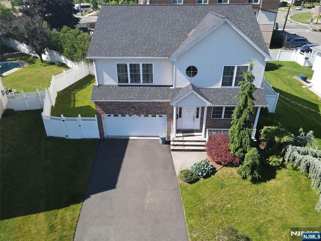 Your next chapter starts here. This beautifully designed home offers the perfect blend of space, comfort, and modern living. The first floor features a bright living room, cozy family room, a TV room, a powder room, and a stunning open-layout kitchen with a large center islandâ€”ideal for hosting and everyday life. Upstairs, the primary suite impresses with a spa-like bath and walk-in closet, along with generously sized 3 bedrooms, a full bathroom, and convenient laundry. The partially finished basement expands your lifestyle even further with a media room and a wide-open area perfect for a gym, play space, or entertainment zone. Step outside to your private oasis: an inground pool, fenced yard, and total privacy. Solar panels (owned, not leased) keep energy costs low while you enjoy resort-style living at home.