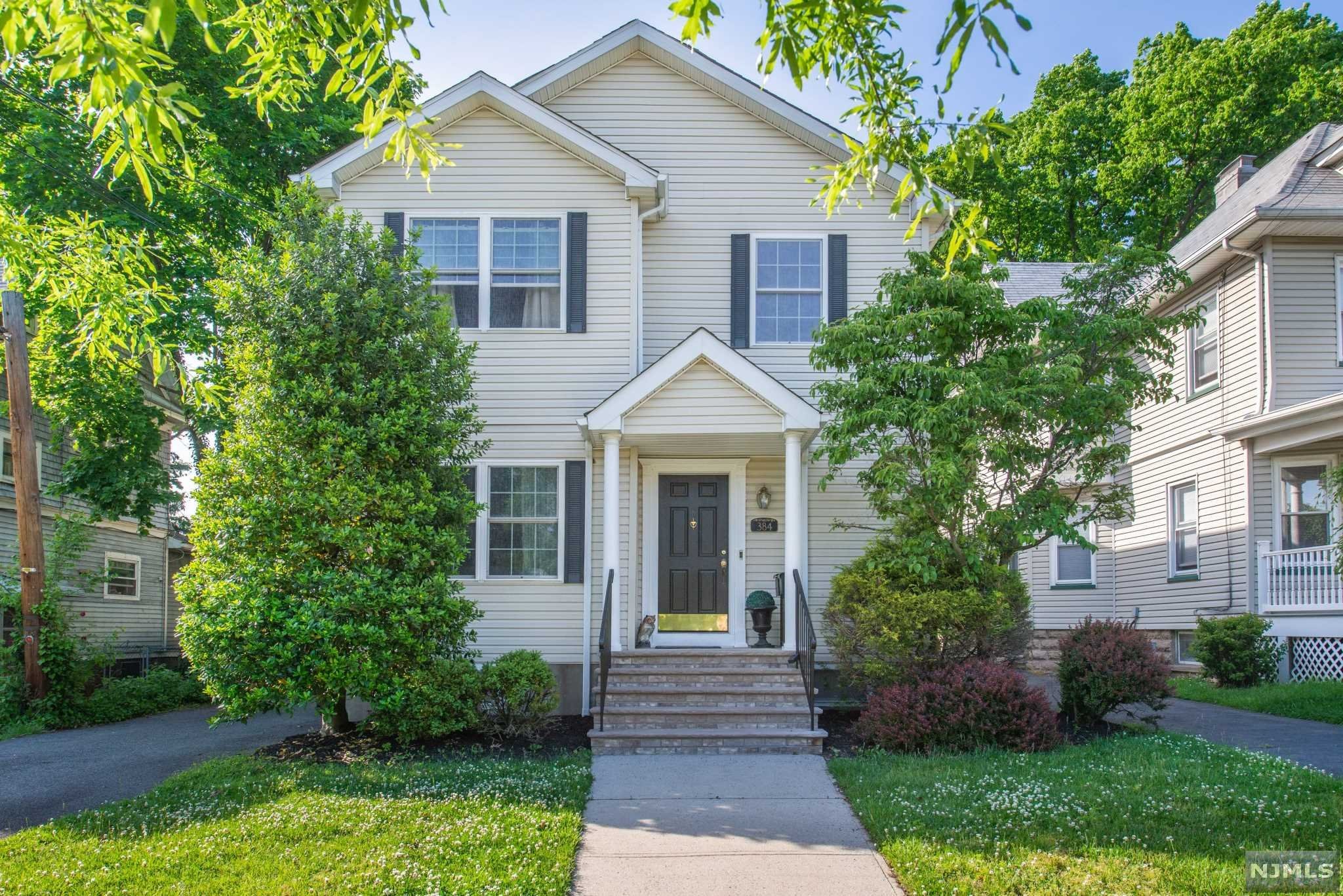 This beautiful 2 family home, built in 2003 and located in the center of town close to shops and NYC transportation is a must see. Both floors offer units that have 3 bedrooms, 2 full baths and very large kitchens. All the utilities are separate. It has central A/C and a laundry room in the basement. There is a nice size back yard with a patio and a detached 2 car garage. The large basement can be finished for additional living space.
