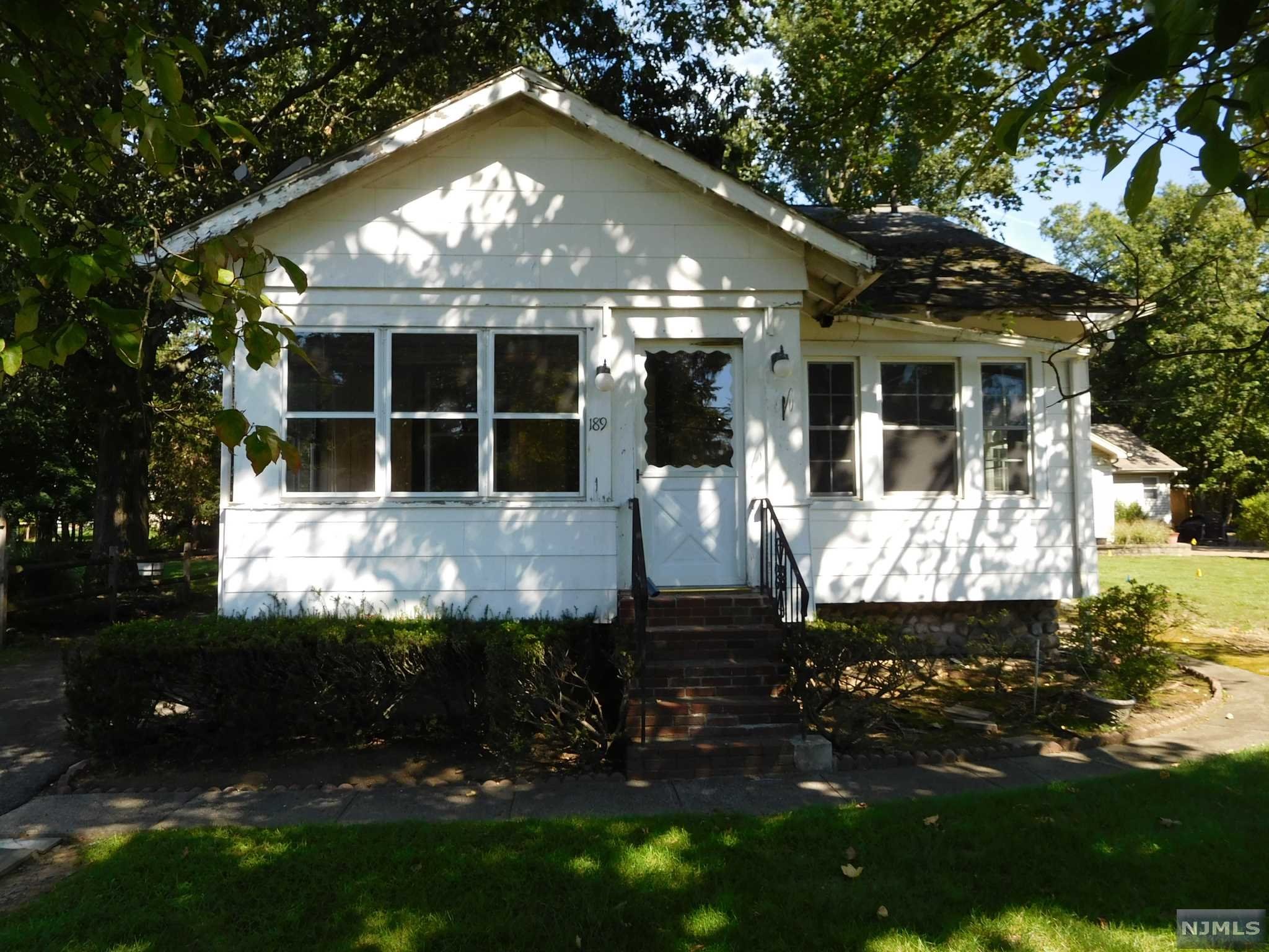Calling all Builders and Contractors - Home needs TLC but worth the look. Home boasts 2 bedrooms, living room, dining room, kitchen, and bathroom on the first floor. Second floor has another bedroom area, and the basement is unfinished. Oil tank above ground in the basement. Detached garage with plenty of parking in the driveway plus the back yard is flat and private. - Walk to New York train /bus transportation, schools, shopping and restaurants. Make this home your own - Owner makes no representation as to condition - being sold strictly "as is" - Enjoy all the amenities that Park Ridge has to offer.