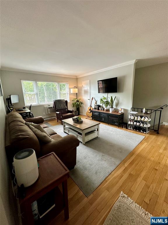 This quiet, sunny, and spacious 1 bedroom, 1 bath condo offers the perfect blend of comfort and convenience in a prime location with easy access to Routes 23 and 287 and within walking distance to shops, restaurants, entertainment and transportation. Boasting a generous layout with large rooms, including a walk-in closet in the bedroom, this well-maintained home features beautiful hardwood floors in the living/dining room and a private balcony. Enjoy the ease of on-site laundry and a designated parking spot. With its private, peaceful atmosphere and unbeatable location, this charming condo is a rare find - schedule your tour today! Furnished Pictures are from previous tenant. No pets, no smoking.