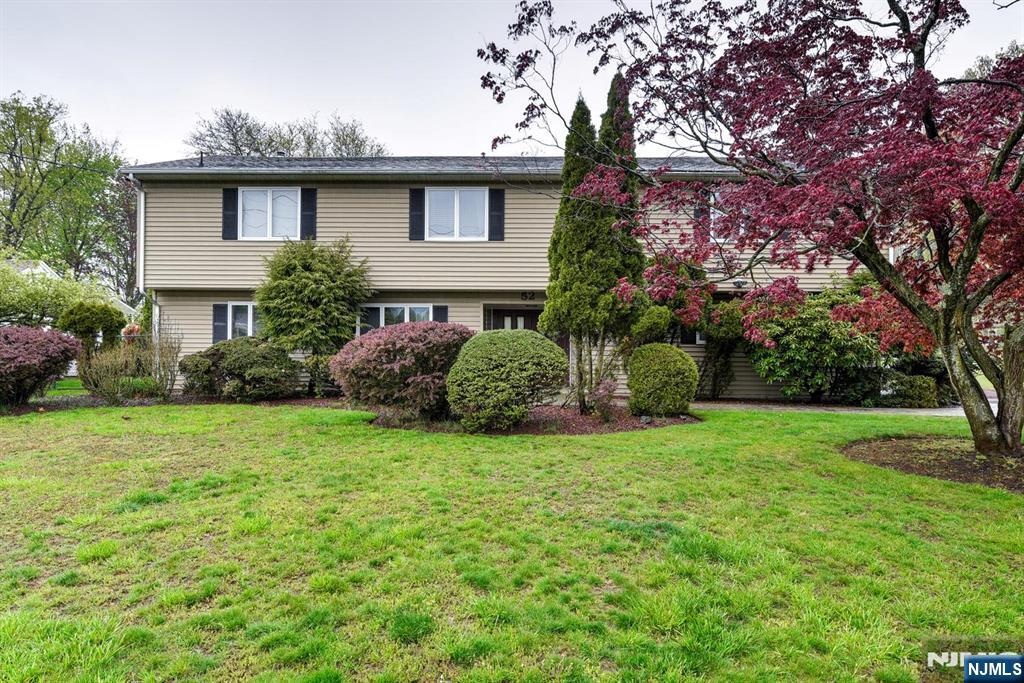 Welcome home to your over 4000 square foot house, where you will have all comforts and luxury you desire in this well established neighborhood. This large beauty sits perfectly on over a third of an acre lot which features manicured grounds and a fenced in private yard to create your own oasis. There are many access features into the home where you well find a great layout with a flexible floor plan that will surely impress and accommodate everyone's needs.. The main house has 4 bedrooms, 2.5 baths living room, family room, eat-in-kitchen, dinning room, and a large semi finished basement. There is a 2 floor large in-law suite which has 2 possible bedrooms, 1.5 baths, living room, dinning room, and kitchen. There is plenty of parking with a long two car wide driveway and