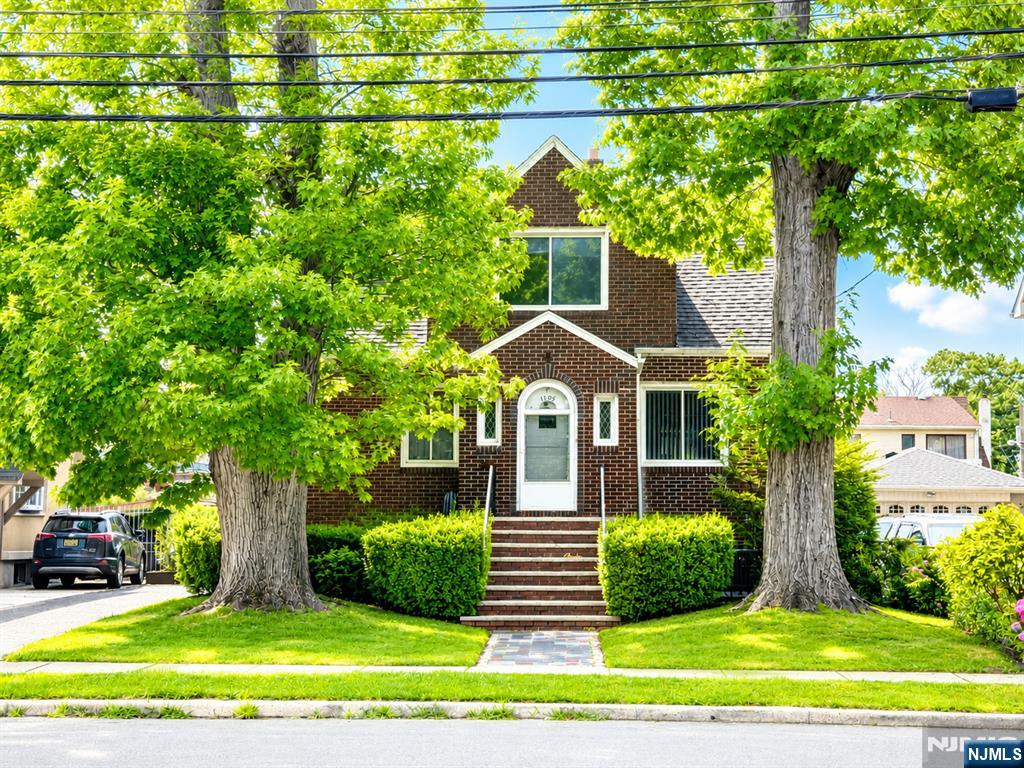 Rare Opportunity in Prime Fort Lee! Builders, investors, and end users will appreciate the exceptional potential of this oversized 50' x 125' level lot located on one of Fort Lee's most desirable and highly visible avenues. This solid brick home offers 4 bedrooms, 3 full bathrooms, a detached one-car garage, and a full basement, providing endless possibilities to renovate, expand, or build your dream home. Enjoy an unbeatable location just steps from NYC transportation, School #4, parks, shopping, restaurants, and major highways, with the George Washington Bridge only minutes away. Whether you're looking for your next residence, redevelopment project, or investment opportunity, this property offers outstanding value in one of Bergen County's most sought-after communities. Property is being sold strictly AS-IS.