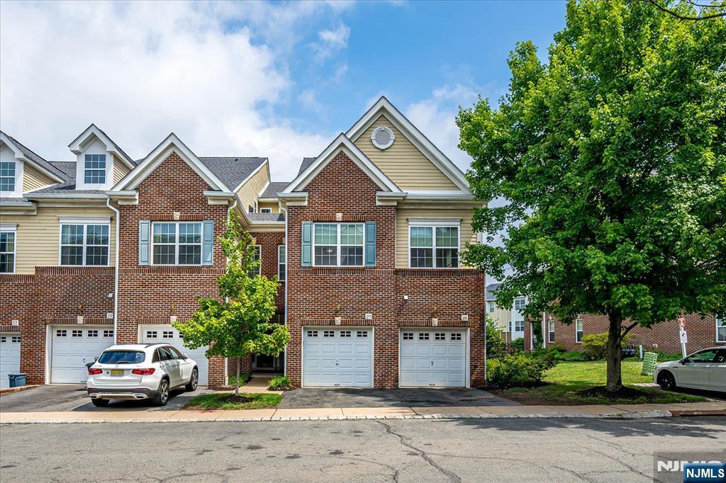 Welcome to this well-maintained 2-bedroom, 2.5-bath townhome located in the heart of historic Morristown, offering comfort, convenience, and an exceptional location.The main level features an open-concept layout with spacious living and dining areas, beautiful hardwood floors, and a kitchen that flows seamlessly into the main living space. A powder room and an attached one-car garage add everyday convenience.The second level includes a spacious primary bedroom with a large closet, an en-suite full bathroom, and sliding glass doors leading to a private balcony. A second bedroom, an additional full bathroom, and a conveniently located laundry and utility room complete the upper level.Conveniently located just around the corner from the Morristown NJ Transit Station with Midtown Direct service to New York City, the home also offers easy access to Routes 287, 24, 80, and 280. Approximately one-half mile from downtown Morristown, you'll enjoy close proximity to restaurants, shopping, parks, cultural attractions, and everyday conveniences.This townhome offers low-maintenance living in one of New Jersey's most sought-after communities, combining a functional floor plan with an outstanding location.