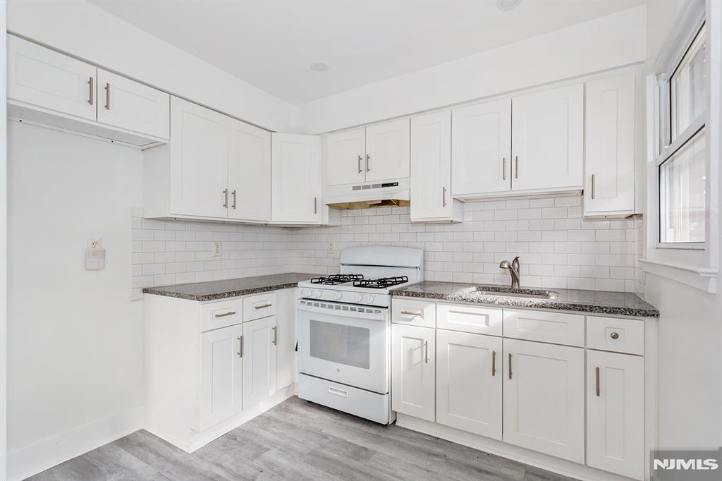 Beautiful, newly renovated 1 bedroom, 1 bathroom apartment within one of the most desired locations of Rutherford, NJ! This completely updated unit features a brand new renovated kitchen with granite countertops, spacious open concept living room & dining room, new floors throughout, brand new stunning/elegant bathroom, and a large bedroom with plenty of closet space. This unit comes with plenty of storage closets and on site parking with plenty of additional street parking available. This building is located around the block from the well known Park Ave, full of amazing shops and restaurants, and is minutes from parks & schools. The bus stop and train are blocks away - truly a commuter's dream! A well-behaved dog or cat will be considered. Landlord requires rental application, credit check, and proof of employment. Don't miss this opportunity to live in a wonderful location within Bergen County, NJ - schedule your showing today!