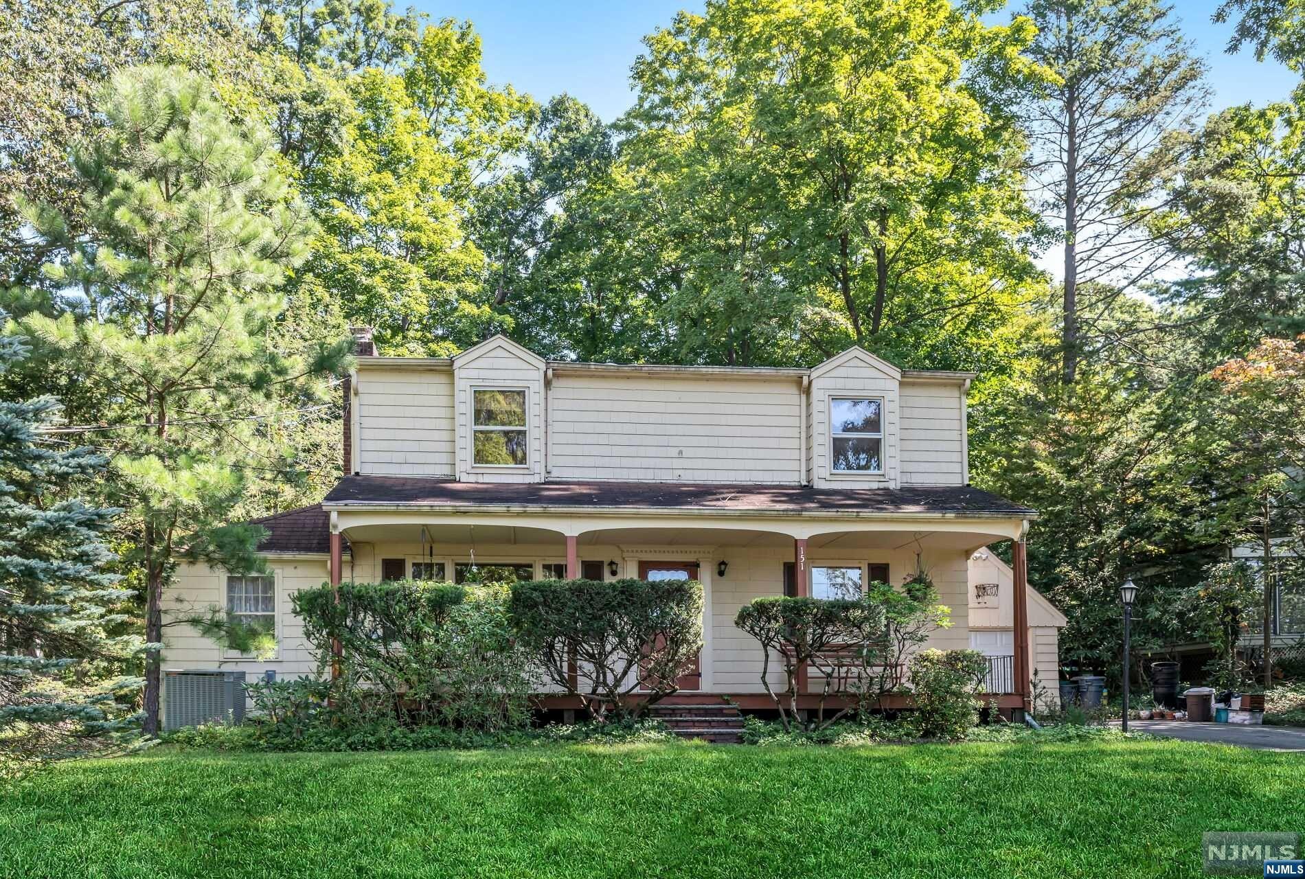 Pines Lake! A diamond in the rough! Great location, across the street from the lake with some water views. House needs some work but so much potential here! Enter the living room with hardwood floors and a fireplace. Step down to the dining room and breakfast room off the kitchen.The kitchen opens to the spacious 21x14 family room off the kitchen with a metal fireplace. There are 2 first floor bedrooms and a full bath on the Main floor. The second floor has a large 19x11 bedroom plus 2 additional bedrooms and a full bath. The partially finish basement has a full bath with laundry plus an outside entrance with steps to the back patio. The outside patio and built in grill needs some work, but the property is large. Come with your ideas and make this house your own. Being sold as is.