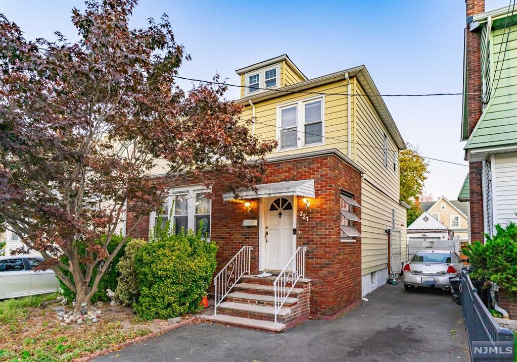Welcome to this beautiful single-family home in the heart of North Newark! This spacious 3-story residence offers plenty of room for comfortable living, with 3 bedrooms and a full bath on the top floor, a large living and dining area on the main level, and a generous kitchen ideal for culinary adventures. The finished basement and attic provide versatile spaces for storage, recreation, or a home office. Outside, enjoy a full driveway accommodating up to 3 cars, plus a detached garage. The expansive backyard is ideal for relaxation, play, or entertaining. Don't miss the opportunity to make this North Newark gem your own! Come turn this house into your home before somebody else does!