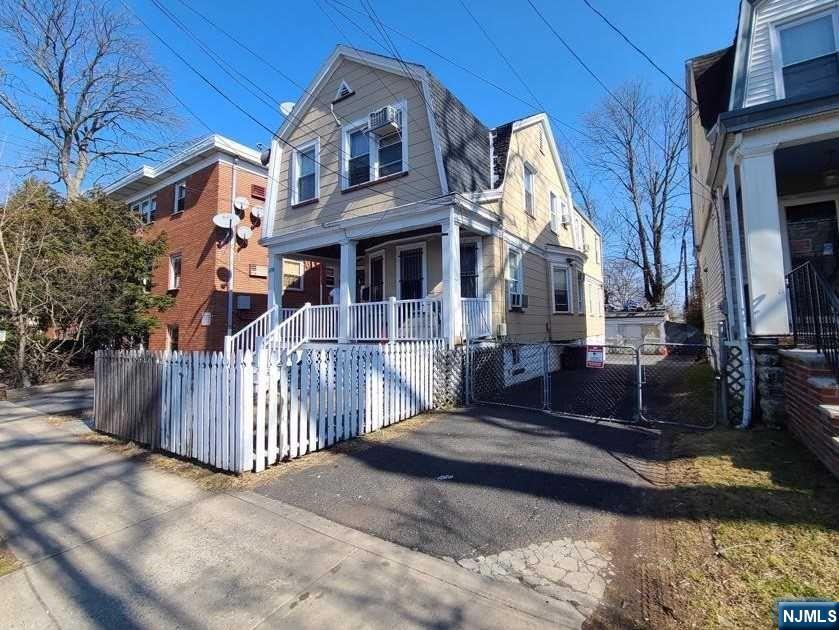 This is a very spacious 2-Family with front porch sits on a over size lot estimated 35 x 106, long asphalt driveway & 2-car detached garage. Apt-1 has 3-bedrooms, kitchen, living room & bathroom. Apt-2 has 3-bedrooms, kitchen, living room & bathroom. Full basement with walkout to the back yard, 2-heating systems, 2-water heaters, 2-electric meters, 2-gas meters. House is centrally located to shopping, parks interstate highways & 10-minute ride to Newark International Airport.