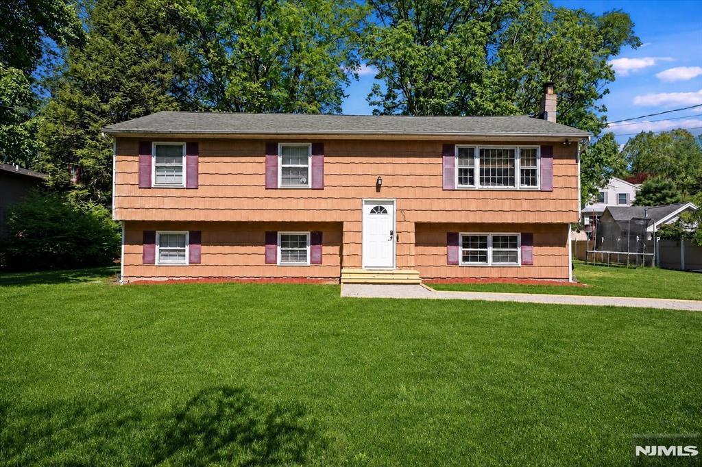 Beautiful 4 Bedroom Bi-Level on Quiet Dead-End Street with Trails, Lake Access & Spacious BackyardTucked away in a peaceful Jefferson neighborhood, this 4-bedroom, 1.5-bath bi-level home offers the perfect blend of privacy, outdoor lifestyle, and flexible living space. Located on a quiet dead-end street with direct access to nearby hiking trails, fishing, and lake recreation, the setting feels like a private retreat while still maintaining a warm neighborhood atmosphere. The main level features a bright living room with vaulted ceilings, dining area, kitchen, three bedrooms, and a full bathroom with both hall and primary bedroom access. Sliding glass doors lead directly to a large elevated deck overlooking the backyard, creating seamless indoor-outdoor flow for entertaining and everyday living. The lower level adds exceptional flexibility with a spacious den/second living room, half bath, laundry room, and a large fourth bedroom/flex space currently used as a playroom ideal for guests, office space, recreation, or extended living needs. Major updates include central air and heating systems installed approximately 5 years ago and a hot water heater replaced around 2 years ago. Appliances including refrigerator, dishwasher, washer, and dryer are included. With large outdoor space, nearby trails and lake access, updated systems, and this home offers the perfect combination of comfort, nature, and functionality. HIGHEST AND BEST UNTIL MONDAY, JUNE 22, 2026 9:00AM.