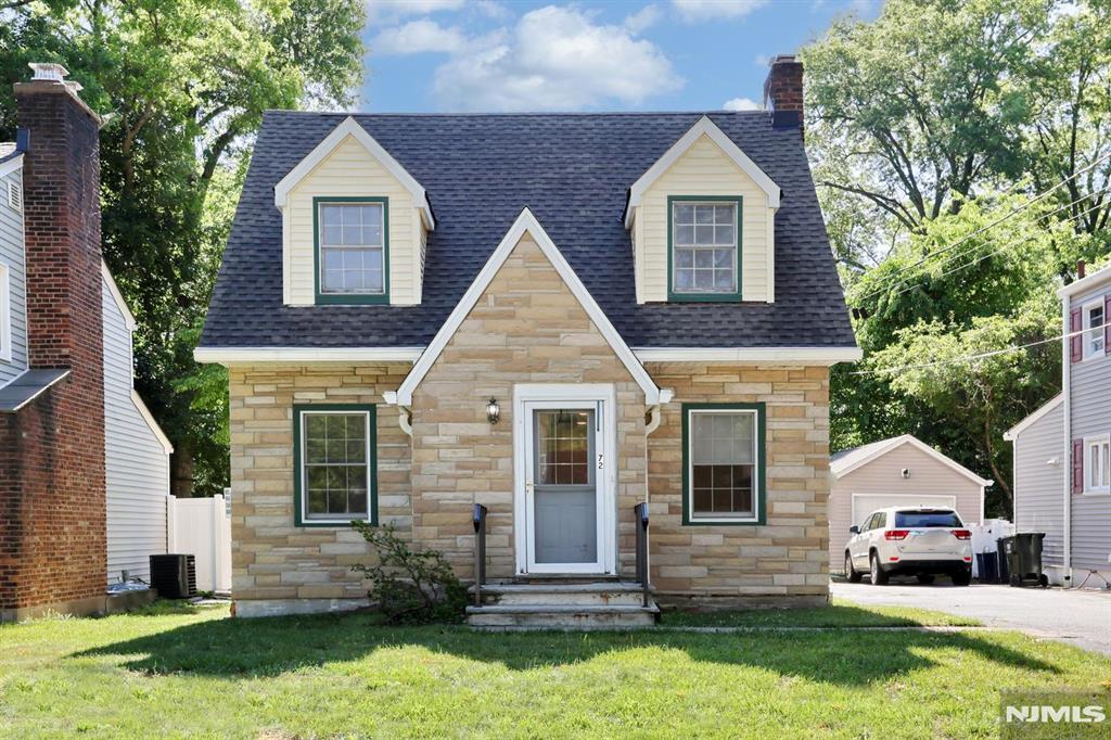 Live in one of Bergen County's most sought-after communities! Demarest is known for its highly rated schools, convenient access to NYC transportation, and exceptional quality of life. Enjoy being just minutes from Whole Foods Market and a variety of shops and restaurants, as well as over 55 acres of scenic trails and open space at the Demarest Nature Center. This charming Colonial, located on a tree-lined street, features 2 bedrooms and 1 full bath. Bright and inviting, the home offers a spacious living room with a cozy fireplace, a generously sized dining room, an updated kitchen, and an unfinished basement with potential for additional living space. Pocket door from the kitchen lead to a recently renovated deck and private backyard, perfect for outdoor enjoyment. The property includes a shared driveway, a detached one-car garage, and additional parking spaces and newer roof. Bring your vision and personal touches to make this delightful home your own. Home is being sold as-is.