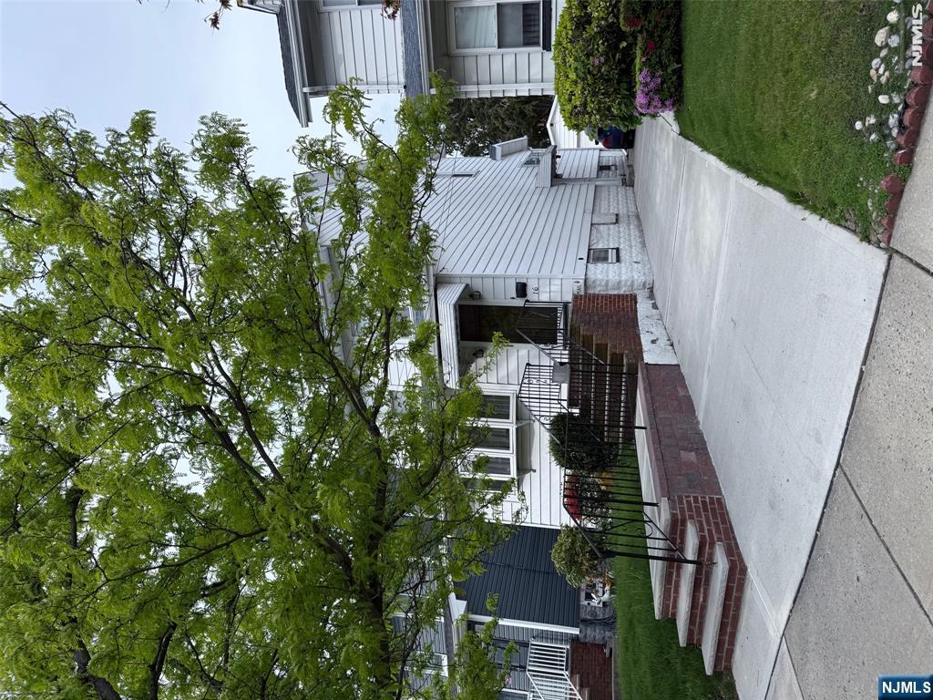 Come see this charming 3-bedroom, 1.5-bath Cape/Colonial located in the heart of North Arlington. Featuring a large living room, formal dining room, and a possible 4th bedroom on the 3rd level, this well-maintained home offers a warm and inviting layout with spacious living areas and plenty of natural light throughout. The partially finished basement provides additional living or storage space. Conveniently located near shopping, schools, parks, and transportation, making it perfect for commuters. A wonderful opportunity to own a beautiful home in a highly desirable neighborhood!