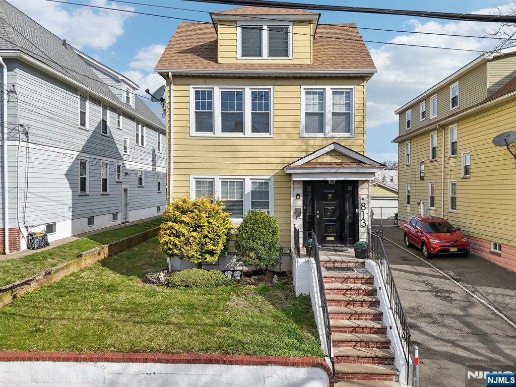 Don't miss your chance to own this well-maintained multi-family home in the desirable Elmora section. Each apartment features two comfortable bedrooms, offering a great opportunity to live in one unit and rent out the other. The first-floor apartment has been recently updated with upgraded kitchen cabinets, newer appliances (oven and gas stove), and an updated bathroom. The second-floor unit includes bonus room a brand-new water heater (2024). The home includes a walkable attic, perfect for additional storage or creative use. Theres also a semi-finished basement perfect for adding your own finishing touches to create additional rec room, home office or storage. All utilities are separate, except for water, making it easier to manage. Gated fenced in yard with paved patio. Ample parking with space for up to 4 cars. Large yard Lot size: 50x200. Located just a short 813 - 815 Pennington to Elmora's vibrant shops, restaurants, places of worship. Location, location.