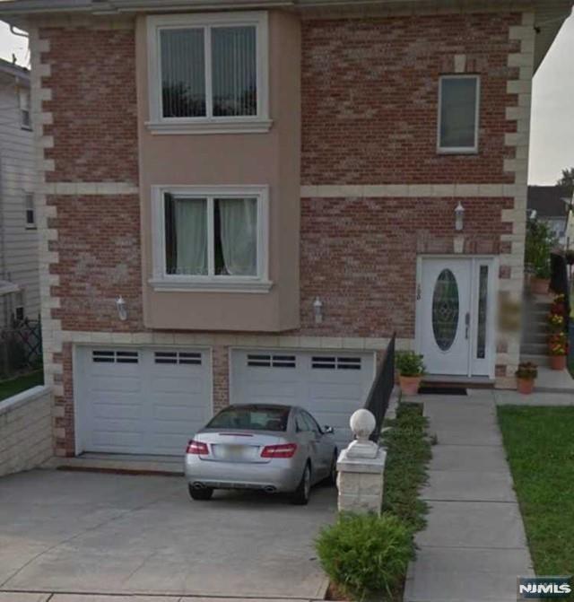 Bright ,large first floor ,three brms two full bath s,,laundry hook ups off kitchen ,hardwood floors Central air conditioning ,central vacuum,parking in the driveway . Share use of yard Near to schools shopping transportation .