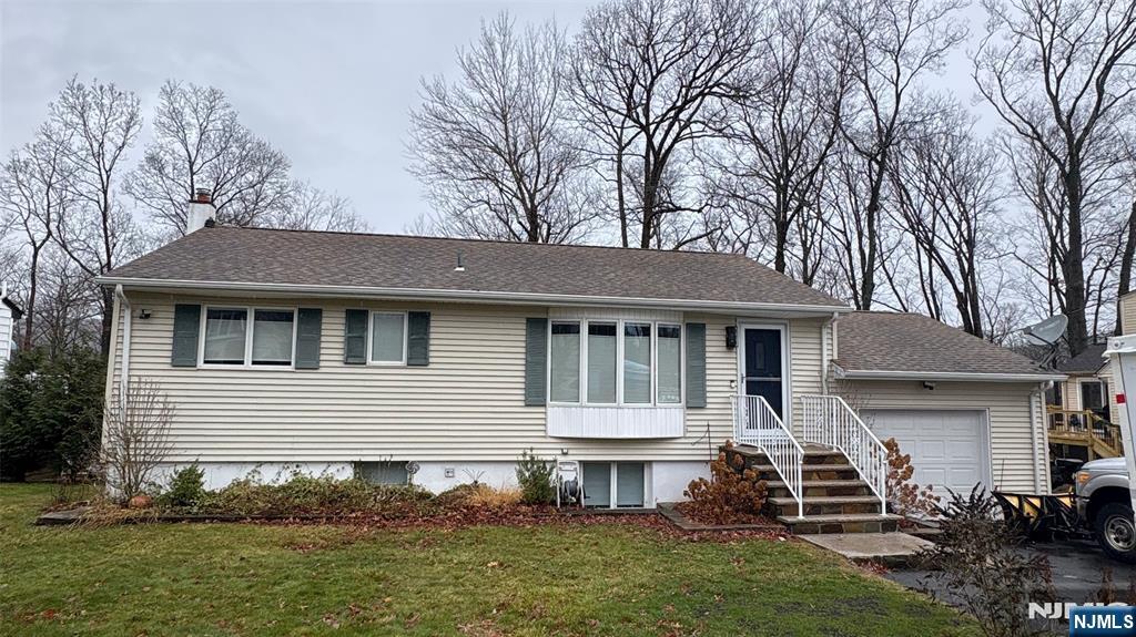 This single-family rental features 3 bedrooms, 2 baths, and a versatile finished walkout basement. The first floor includes a bright living room, dining room with deck access, galley kitchen, three comfortable bedrooms and a full bathroom. The lower level adds two bonus rooms, another full bath, laundry, storage, and a walkout to the patio.