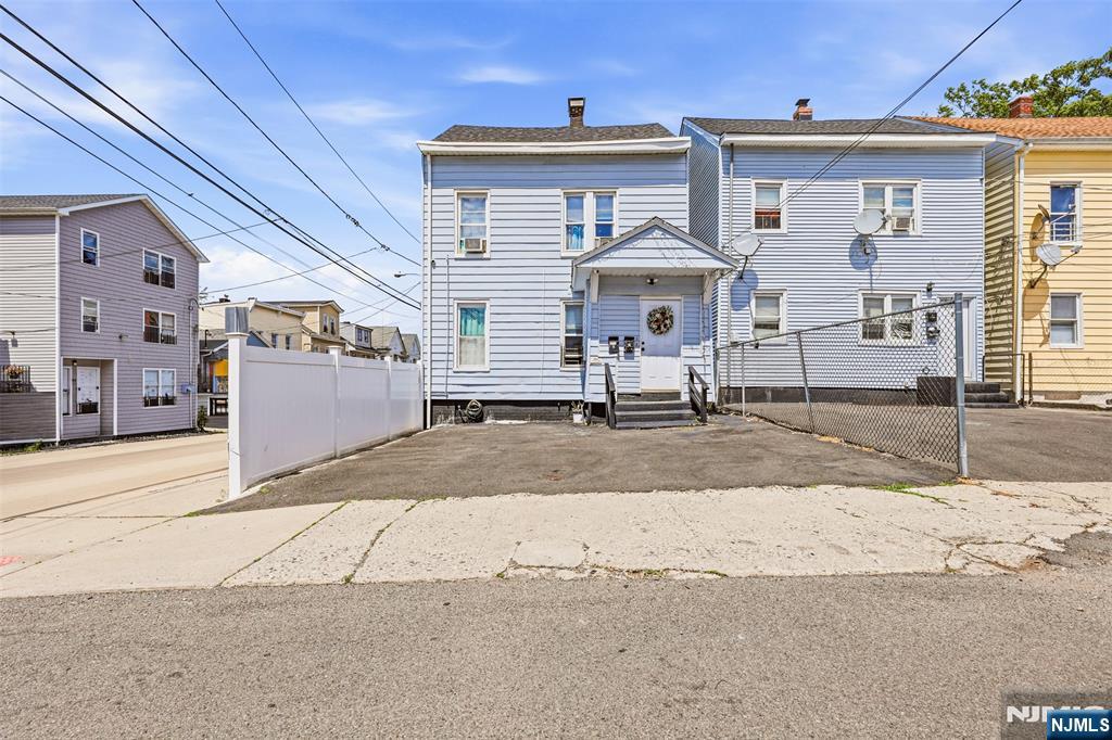 Great opportunity to own a well-maintained two-family home in Paterson! Ideal for investors seeking rental income or first-time homebuyers looking to live in one unit while generating income from the other. Conveniently located near schools, shopping, and public transportation. Don't miss this excellent investment opportunity!