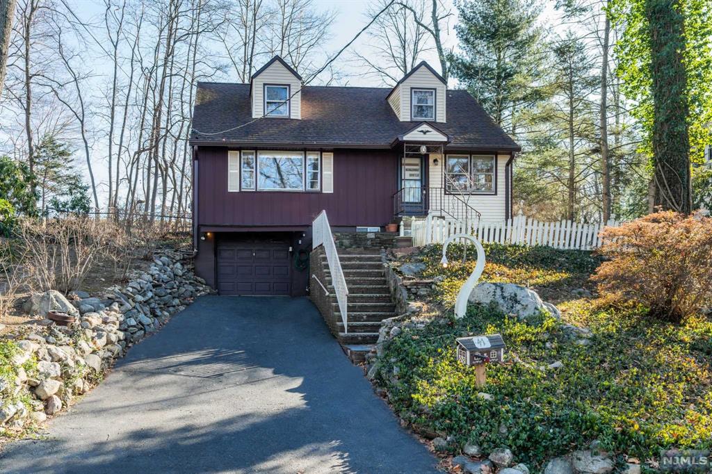 Opportunity Knocks! Live in a Wonderful Lake Community. Welcome Home to this 3-bedroom Home Close to Schools with Beautiful Lake Views. Large Eat In Kitchen with a Gas Range, Main Level Bedroom, Full Bathroom with a Stall Shower and a Living Room with Lake Views and Electric Fireplace. Upstairs has 2 additional Bedrooms. The Lower level offers a Recreation Room, a Laundry Room / Storage Room and a 1 Car Garage. Go to Stonybrook School from your own Backyard. Fayson Lakes is a Wonderful Lake Community where Memories are made. Enjoy Swimming, Boating, Fishing, Sailing, Tennis, Swim Lessons, Swim Races and Fun Activities for everyone. Kinnelon Offers a Top-Rated School System Year after Year and is close to Shopping, Restaurants, Transportation, Major Highways, Golf Courses, Hiking Trails and is only appro. 35 miles from NYC.
