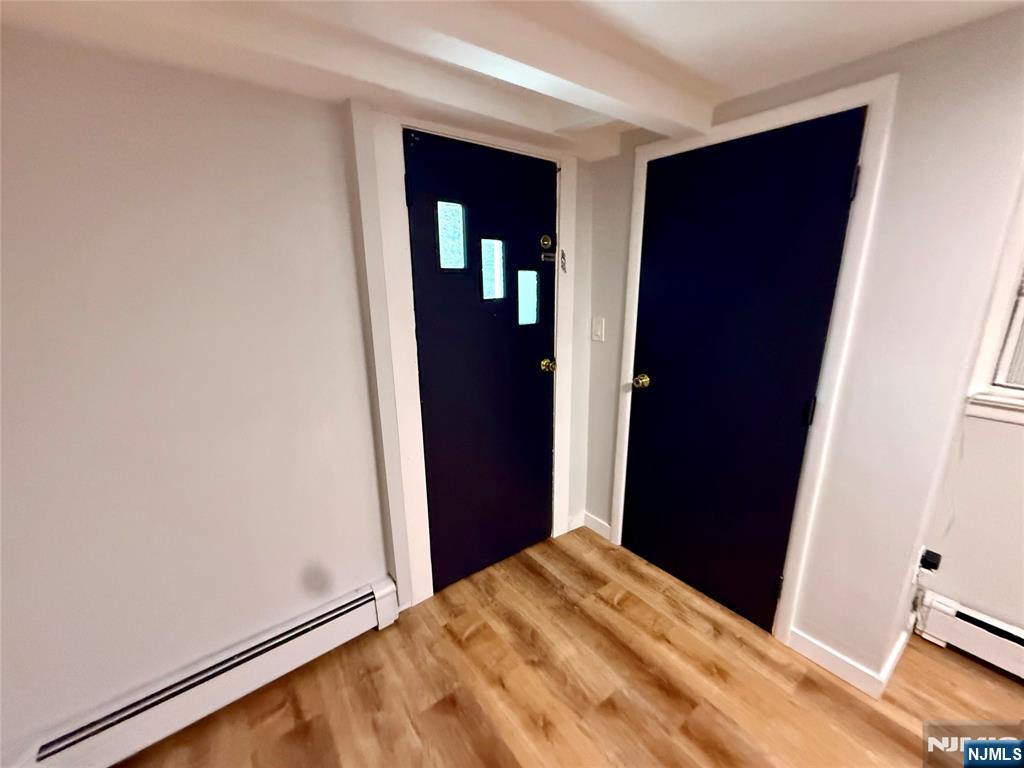 Updated ground floor apartment is ready for new tenant in Garfield, NJ. The cozy unit offers eat in kitchen, living room, bedroom and full bathroom. There is NO laundry, however the laundromat is nearby. There is 1 parking spot in driveway. No smoking and no pets are allowed. . Property is located a short distance to parks, highways 46, train and bus transportation. Do Not Wait and Call Now! Credit, interview and proof of income required, along with 1.5 months security. Garfield offers free preschool.