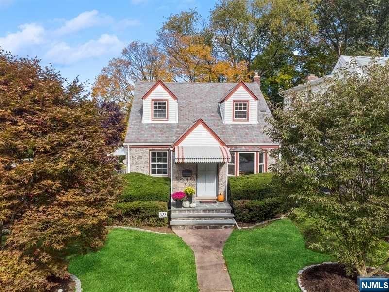 Welcome to this beautiful, light filled Cape Cod that sits nestled on a corner lot on a desirable Cul-De-Sac in the sought-after town of Westwood. Fabulous location! This house has been lovingly maintained throughout the years and has many updates throughout. The open floor plan lends itself to great entertaining possibilities inside the home, and the lush, private, manicured park-like yard is perfect for outside entertaining. Great outside patio off the kitchen & screened in porch that adds to the outside appeal of this home. The gas fireplace in the living room makes it easy to enjoy a fire with no mess. Nice sized formal formal dining room and modern eat-in kitchen with breakfast nook, half bath, screened in porch and laundry room (which could be converted to a first-floor 4th bedroom) finish off the first floor. Full bath and three bedrooms on the second floor are all a good size. Awesome finished basement with wet bar and extra storage space. Truly a wonderful town & home!