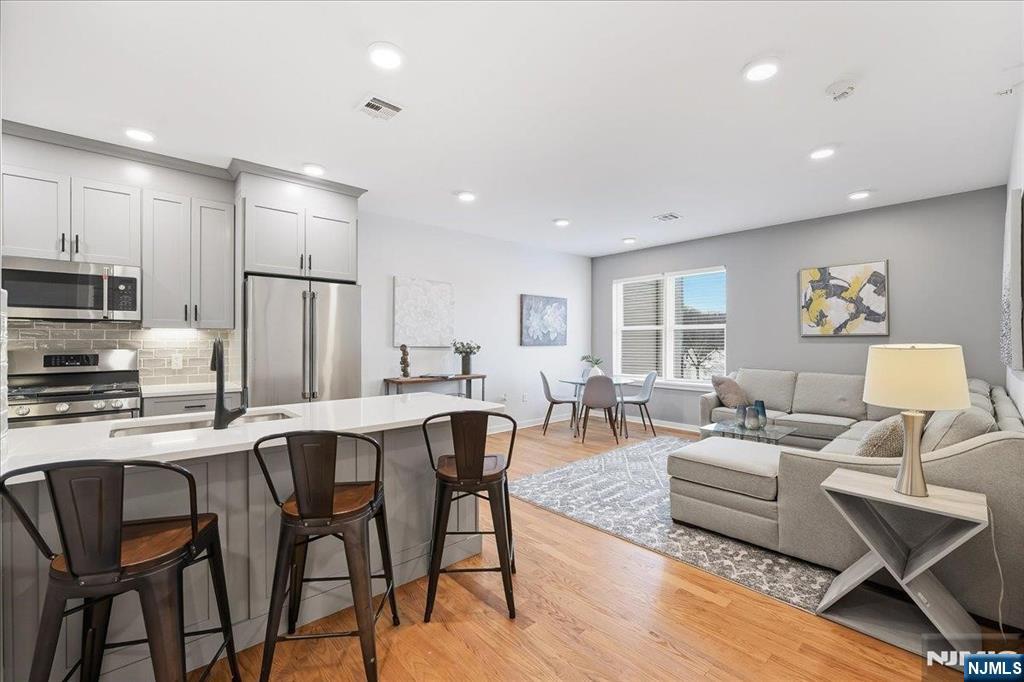 **SPECIAL OFFER - PARKING INCLUDED** Discover Liberty Place - Bloomfield's newest boutique condo community. Now selling our penthouse level. Each residence features solid oak floors, 9ft ceilings, quartz countertops, GE appliances, in-unit washer/dryer, tankless hot water heater, nest thermostat, and primary bath with dual sinks. One deeded parking space available for purchase and can be included in the mortgage. Building amenities include a rooftop deck, wellness gym with NordicTrack equipment, and bike storage. HOA covers water, landscaping and snow removal, garbage and recycling, master insurance, common area maintenance, and building reserves. Located in Bloomfield at the border of Montclair and Glen Ridge, you are in the center of it all! Amazing central location, close to restaurants, shopping, parks and entertainment and just a quick 35 minute train ride to NYC. 5-year tax abatement. 10-year New Construction Warranty. Pets allowed.