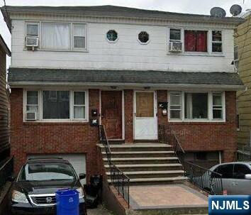 Great opportunity to own this two-family home in a highly desirable commuter location! Each unit offers 2 bedrooms and 1 full bath, with hardwood floors throughout. The first-floor unit is vacant and ready for owner occupancy or immediate rental income, while the second-floor unit provides additional income potential. Features include a garage, off-street parking, and separate living spaces. Conveniently located near the train station, shopping, schools, and major transportation routes. Ideal for investors or owner-occupants looking to offset expenses with rental income. Don't miss this versatile multi-family property with endless possibilities!