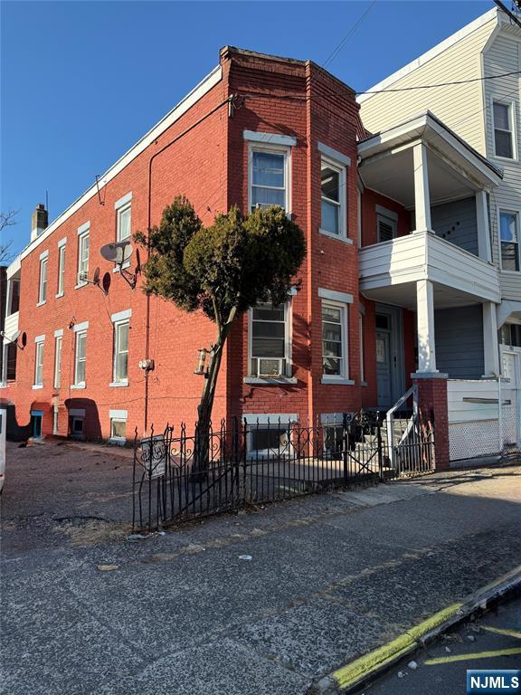 All Brick, Multifamily home with two residential units on a 50x100 lot. Total of twelve rooms. Six rooms, three bedrooms, one full bathroom on each floor. Full unfinished basement. Driveway for approx 6 cars. Partially fenced yard. Separate Heat, Gas, Electric, Hot water. Flat roof. Close to shopping, schools, Major highways 80, 19, GS Parkway, 46, 21.