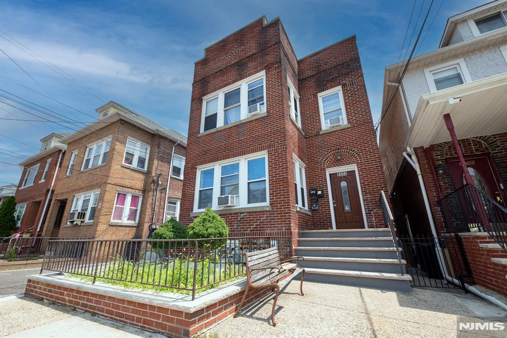 Located in the highly sought-after Racetrack section of North Bergen, this solid brick two-family home offers exceptional space, versatility, and income potential. Each unit features 3 spacious bedrooms, 1 full bathroom, and 2 bonus dens, providing flexible space for a home office or more. The fully finished walk-out basement includes a kitchen, full bathroom, and 3 additional bonus rooms. The property also features a detached 2-car garage plus a driveway with parking for 3 additional vehicles. Conveniently located near shopping, restaurants, parks, schools, and NYC transportation, this is an outstanding opportunity for both investors and owner-occupants.