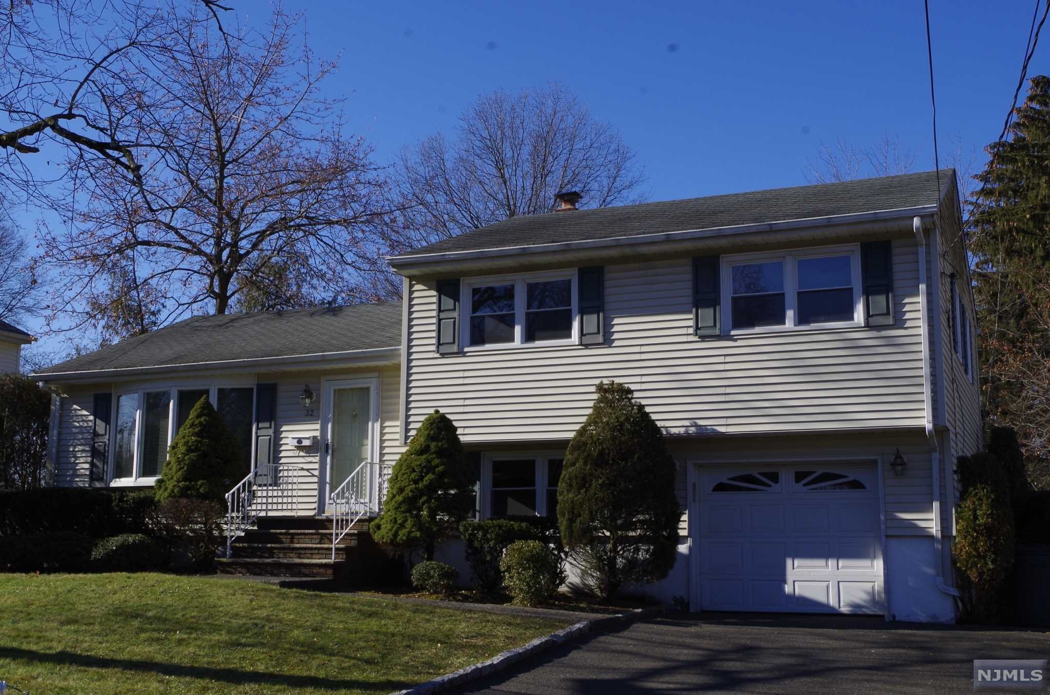 THIS 3 BR, 1.5 BA SPLIT LEVEL IN THE WEST HILL SECTION OF EMERSON HAS CENTRAL AIR, SGD TO AN OVERSIZED DECK OVERLOOKING A PARK-LIKE YARD, KITCHEN SKYLIGHT AND JACUZZI IN MAIN BATH. THE HOUSE HAS A FULL UNFINISHED BASEMENT, ONE-CAR GARAGE WITH DOUBLE-WIDTH DRIVEWAY. THE FIRST FLOOR INTERIOR HAS BEEN RECENTLY PAINTED IN NEUTRAL COLORS AND FEATURES RECESSED LIGHTING. LOCATED IN A TREE-LINED NEIGHBORHOOD NEAR MEMORIAL SCHOOL, THE HOUSE IS CLOSE TO BUS AND TRAIN TRANSPORTATION.