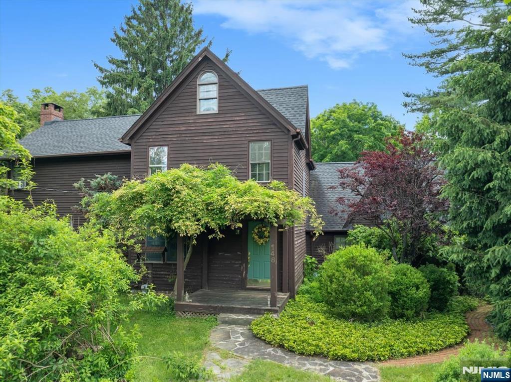 Rare opportunity to own a charming antique Colonial set on 1.3 acres of breathtaking park-like property in sought-after Montvale, NJ. This special home blends timeless character with spacious living and unique bonus spaces that are hard to find today. Featuring 4 Bedrooms and 2.5 Baths, this home offers warmth, charm, and flexibility throughout. The updated kitchen is designed for gathering with granite countertops, center island, and sliding glass doors leading to a private deck overlooking the gorgeous property. The stunning Great Room is the heart of the home, featuring a dramatic fieldstone fireplace and elegant French doors that create an inviting atmosphere year-round. The Primary Suite offers a peaceful retreat with its own full bath and French doors opening to a Sun Room ... the perfect place to relax with your morning coffee or unwind at the end of the day. Adding even more value and character to this exceptional property is a separate Barn/Cottage complete with a wood-burning stove, ideal for a studio, workshop, hobby space, or private retreat. The attached 2-car garage includes a heated loft above, offering endless possibilities for office space, recreation, storage, or creative use. All this in a premier Montvale location close to major highways, NYC train/bus transportation, fabulous shopping, restaurants, and highly rated schools. A truly unique property offering charm, privacy, and versatility in one of Bergen Countyâ€™s most desirable towns.