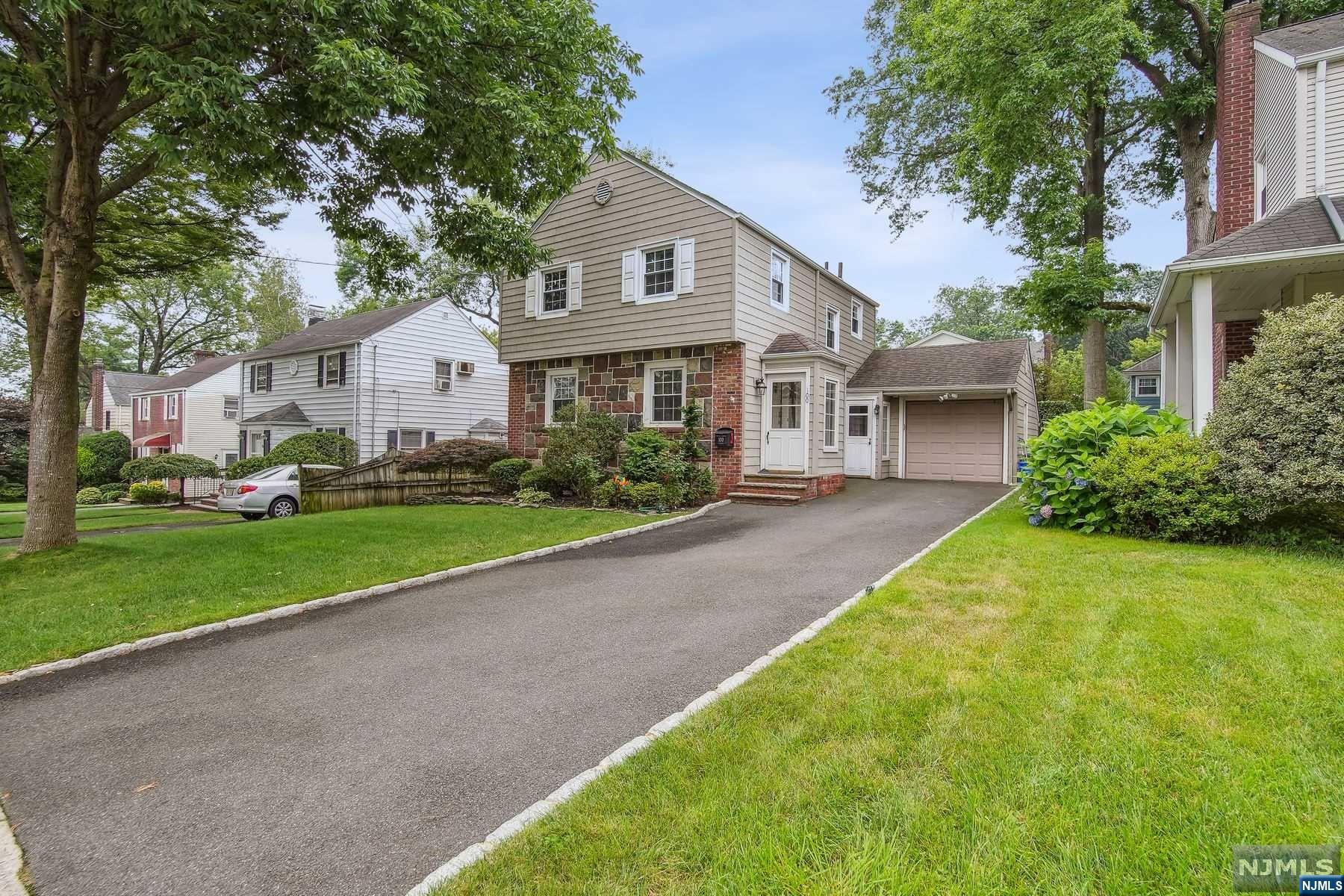 Welcome to 100 Van Buren: This 3 bedroom and 2.5 bathroom home is located in Prime Teaneck. Beautiful hardwood floors greet you upon entering, leading you to the wood-burning fireplace on the opposite side. The updated kitchen opens into the formal dining room with Eastern exposure that allows for warm sunlight to blanket the area. Continuing towards the back, you'll see the perfect family room with a built-in home office that opens up onto your deck. There are bathrooms on each of the 3 floors. The fully finished basement has a full bathroom and is pre-wired for a home entertainment system. New Carrier HVAC and Air condenser installed in 2022. Parks, Restaurants, Shops and Easy NYC Access, via 167T or 167Q, getting you into Port Authority in 30min, are all nearby. Welcome Home!